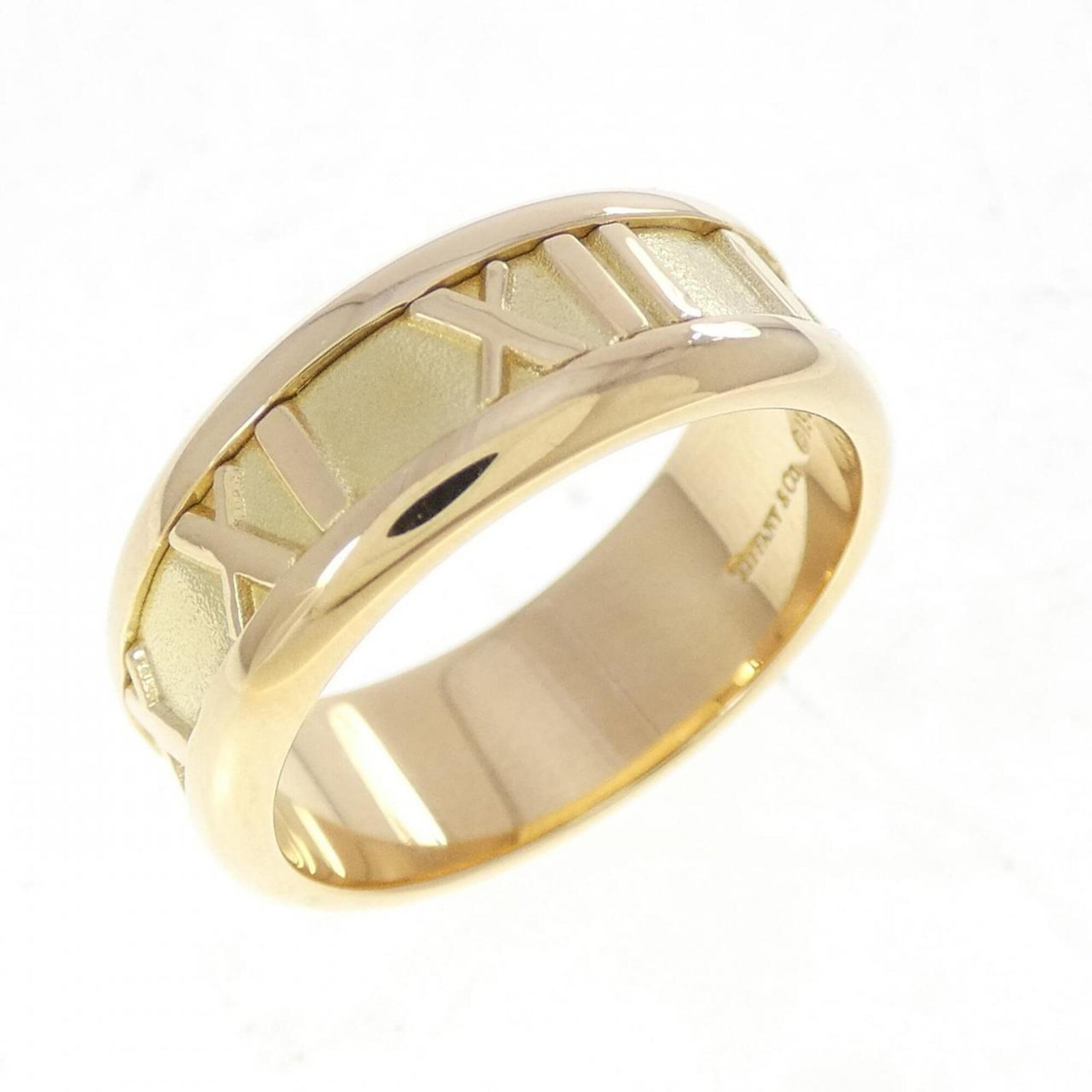 Yellow Gold 18K Tiffany Band Ring: Yellow Gold 18K Tiffany Band Ring Yellow gold (18K) band ring from Tiffany, available in US size 6.5. This 18K yellow gold band features a classic design that complements various outfits. The ring's