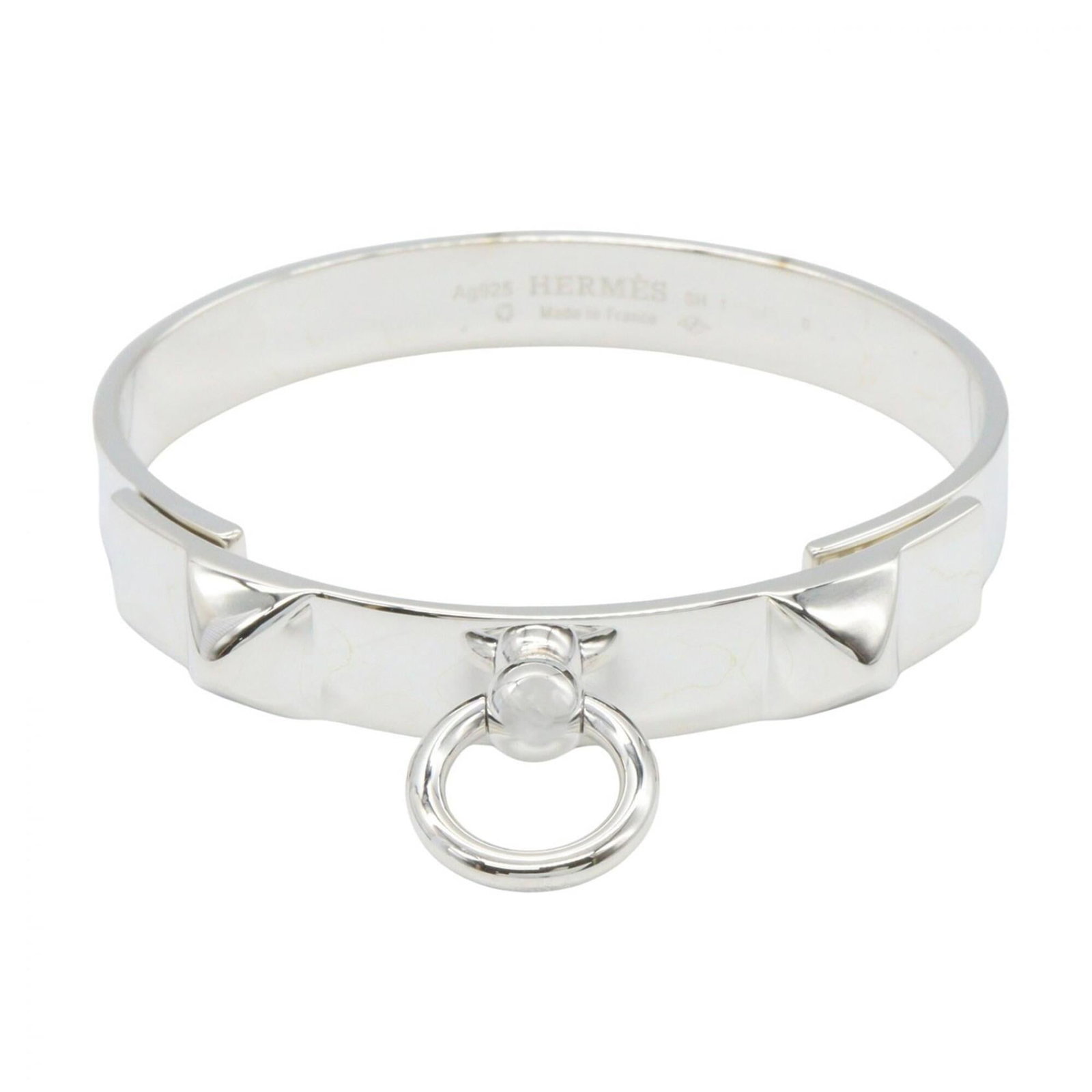 Hermes bangle silver 925: Hermes bangle silver 925 Silver bangle from Hermes, made with 925 sterling silver. This elegant bangle showcases the brand's signature style and sophistication. Its sleek design makes it a versatile a