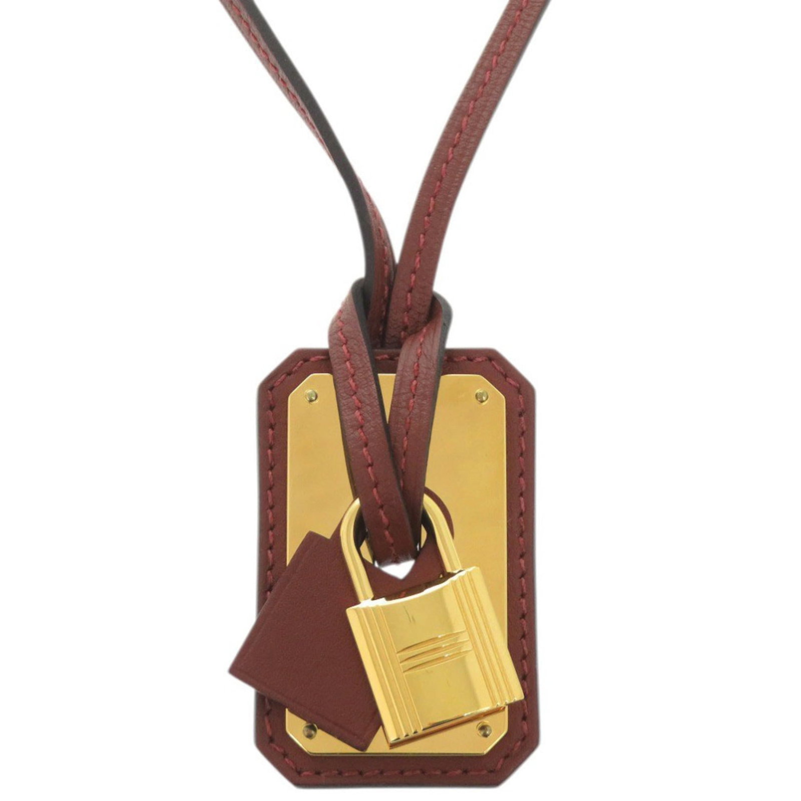 Hermes Like New Herms O'Kelly Gm Swift Rouge H Leather Pendant Necklace In Red With Gold Hardware: Hermes Like New Herms O'Kelly Gm Swift Rouge H Leather Pendant Necklace In Red With Gold Hardware Swift Rouge H leather pendant necklace in red with gold hardware. This Hermes-like piece features a st