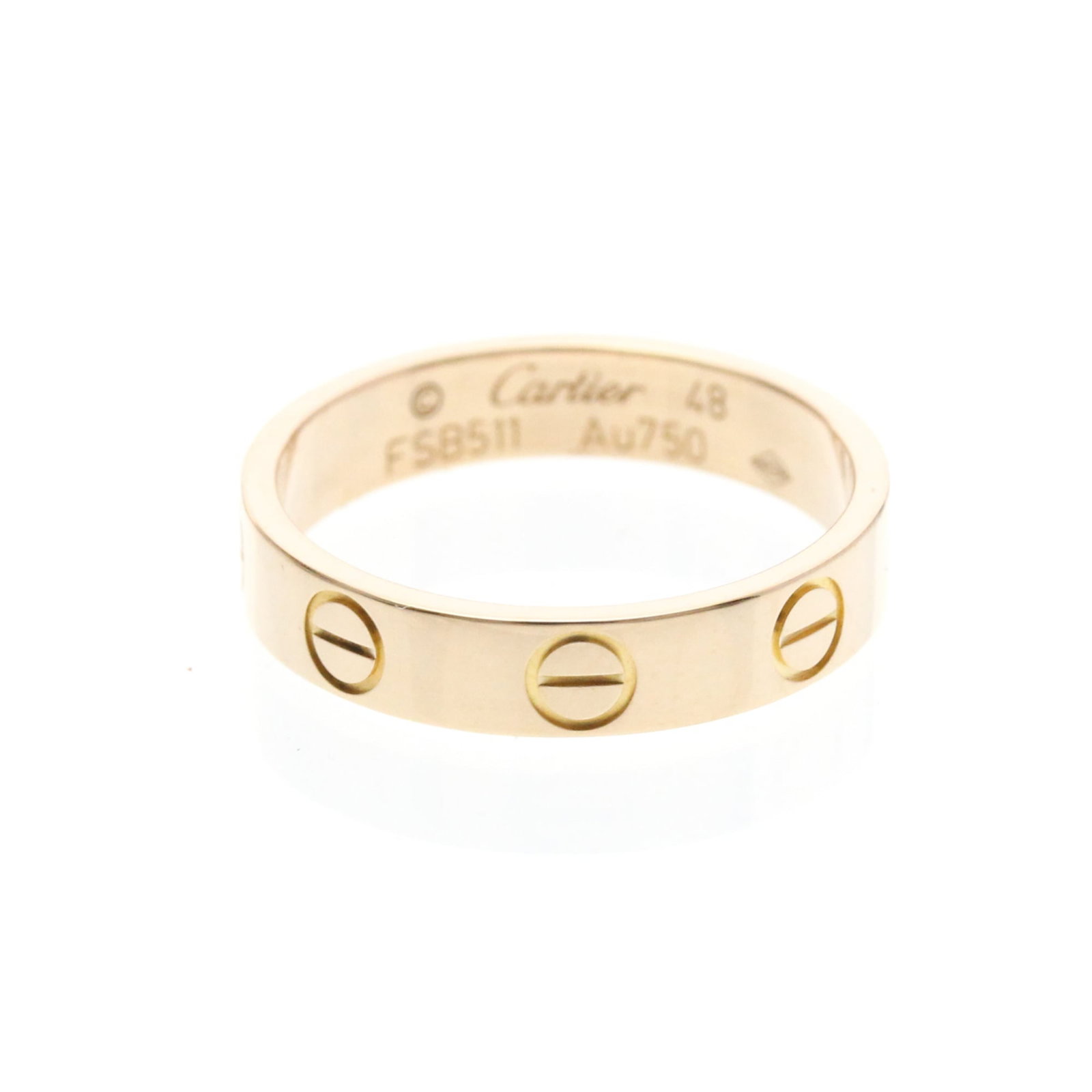 Pink Gold Cartier Band Ring 18K: Pink Gold Cartier Band Ring 18K Pink Gold Cartier Band Ring 18K - A delicate and elegant pink gold band ring from the renowned French luxury brand, Cartier. Measuring 4 1/2 in US size with a width of 