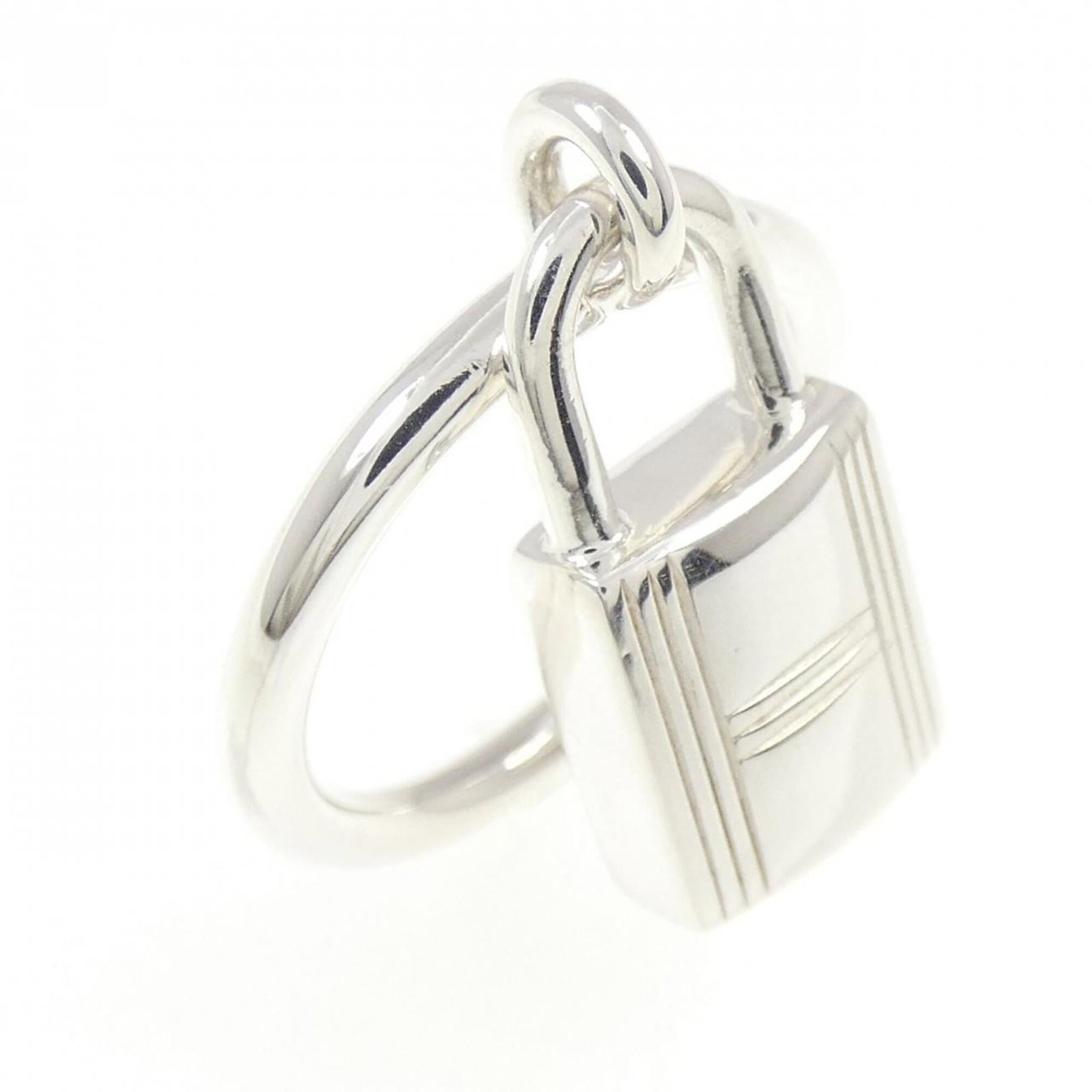 Ring of Silver Band by Hermes: Ring of Silver Band by Hermes Silver Band Ring by Hermes features a sleek and modern design, crafted from high-quality silver (925) for a touch of elegance. This band ring is designed to fit comfortab