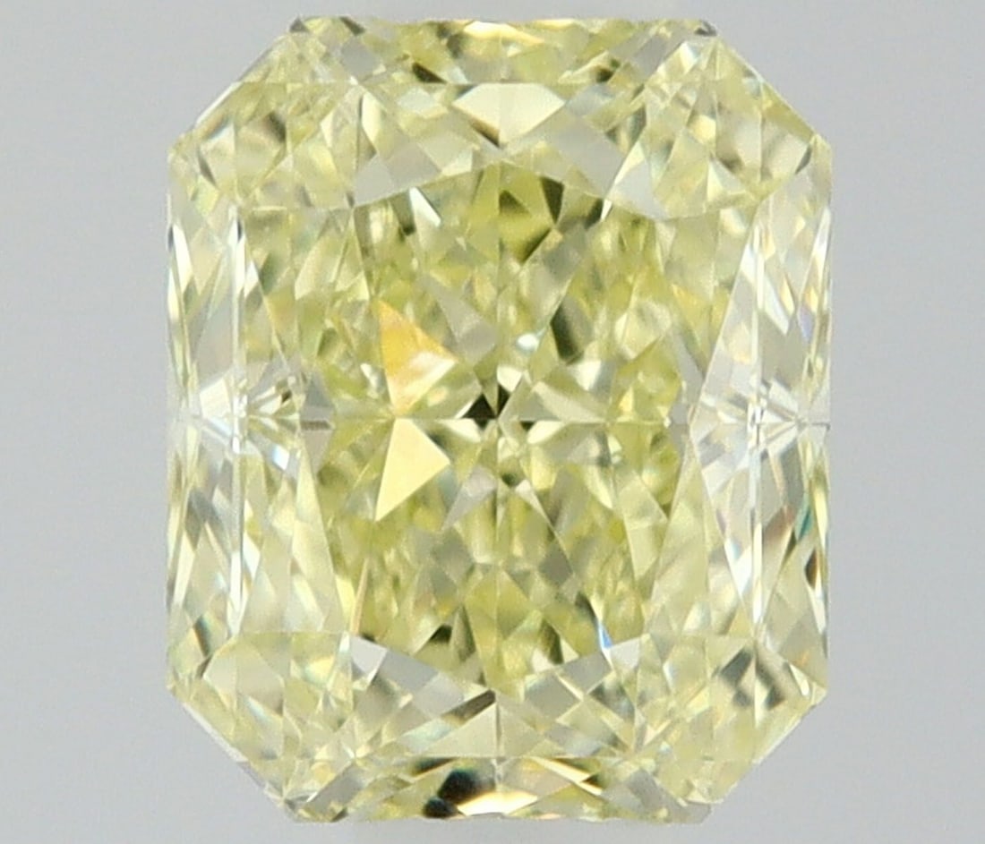 Radiant 0.37ct Fancy Light Yellow VVS2 - Loose Natural Diamond: Radiant 0.37ct Fancy Light Yellow VVS2 - Loose Natural Diamond 0.37ct Fancy Light Yellow VVS2 - Loose Natural Diamond, showcasing exceptional clarity and vibrant color, with minimal inclusions that en