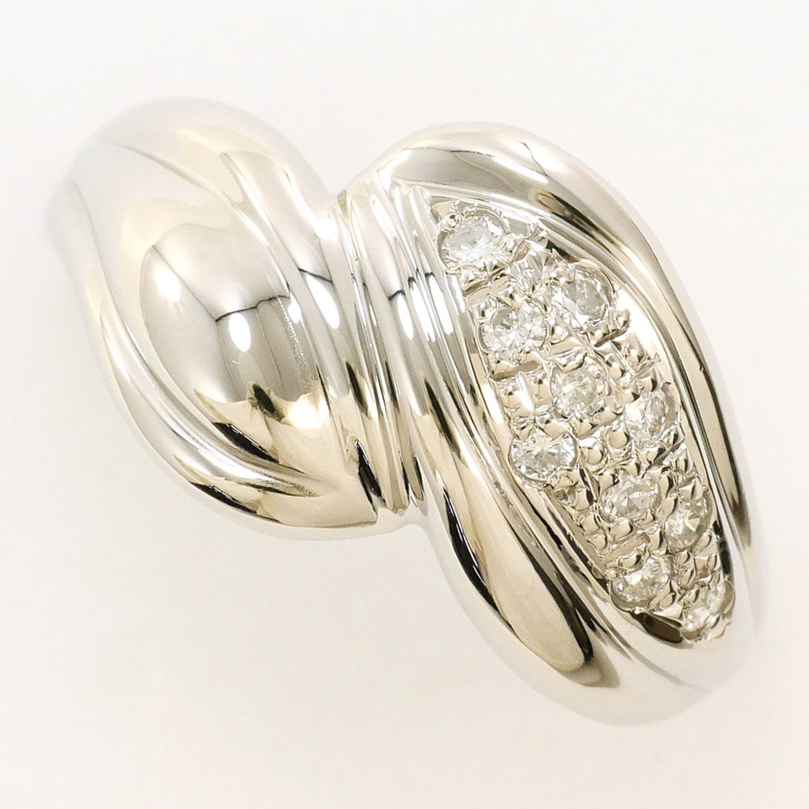Ring Band Platinum 850: Ring Band Platinum 850 Platinum 850 band ring features a diamond stone and measures 12mm in width, with a US size of 6.5. Weighing 4.8g, this platinum band showcases a 0.13 carat diamond. Made from hi