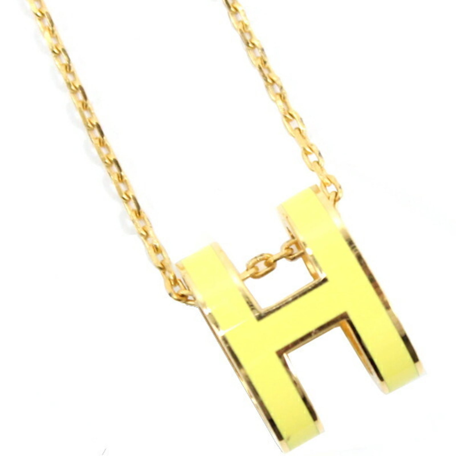 Hermes Herms Pop H Necklace In Yellow Gold Lacquer Women's T6029: Hermes Herms Pop H Necklace In Yellow Gold Lacquer Women's T6029 Yellow Gold Lacquer Necklace from Hermes' Pop H Line. This women's necklace features a 16mm x 12mm pendant in yellow gold lacquer, susp