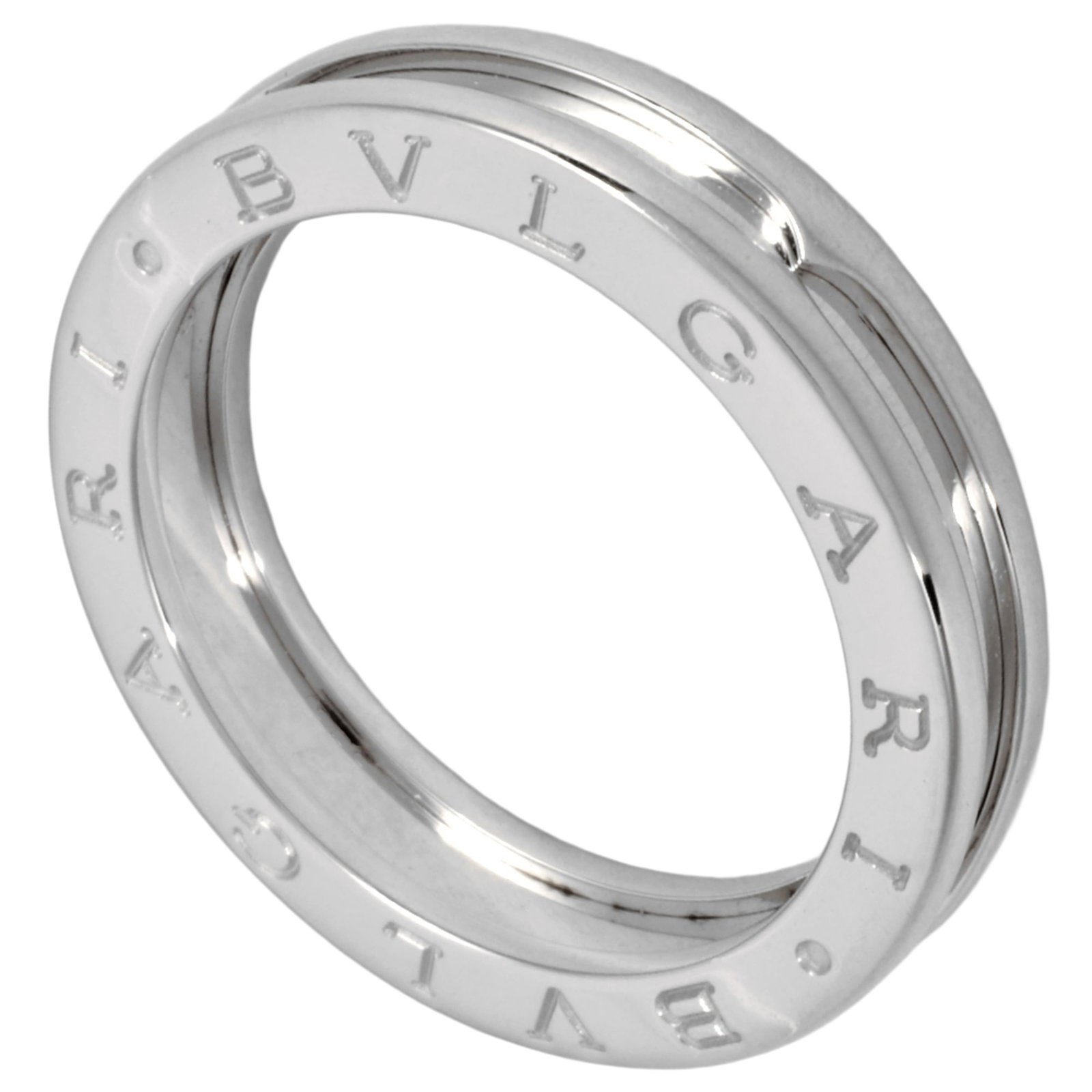 White Gold Bvlgari Ring Band: White Gold Bvlgari Ring Band White gold (18K) band ring from Bvlgari, featuring high-quality craftsmanship and attention to detail. This women's ring boasts a sleek design with a classic style that su