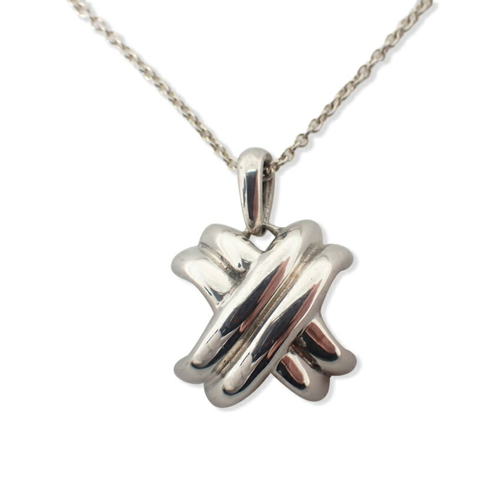 Signature Cross Pendant Necklace from Tiffany Co.: Signature Cross Pendant Necklace from Tiffany Co. Sterling silver pendant necklace from Tiffany Co. features a signature, crafted with attention to detail in 925 material. The necklace boasts a