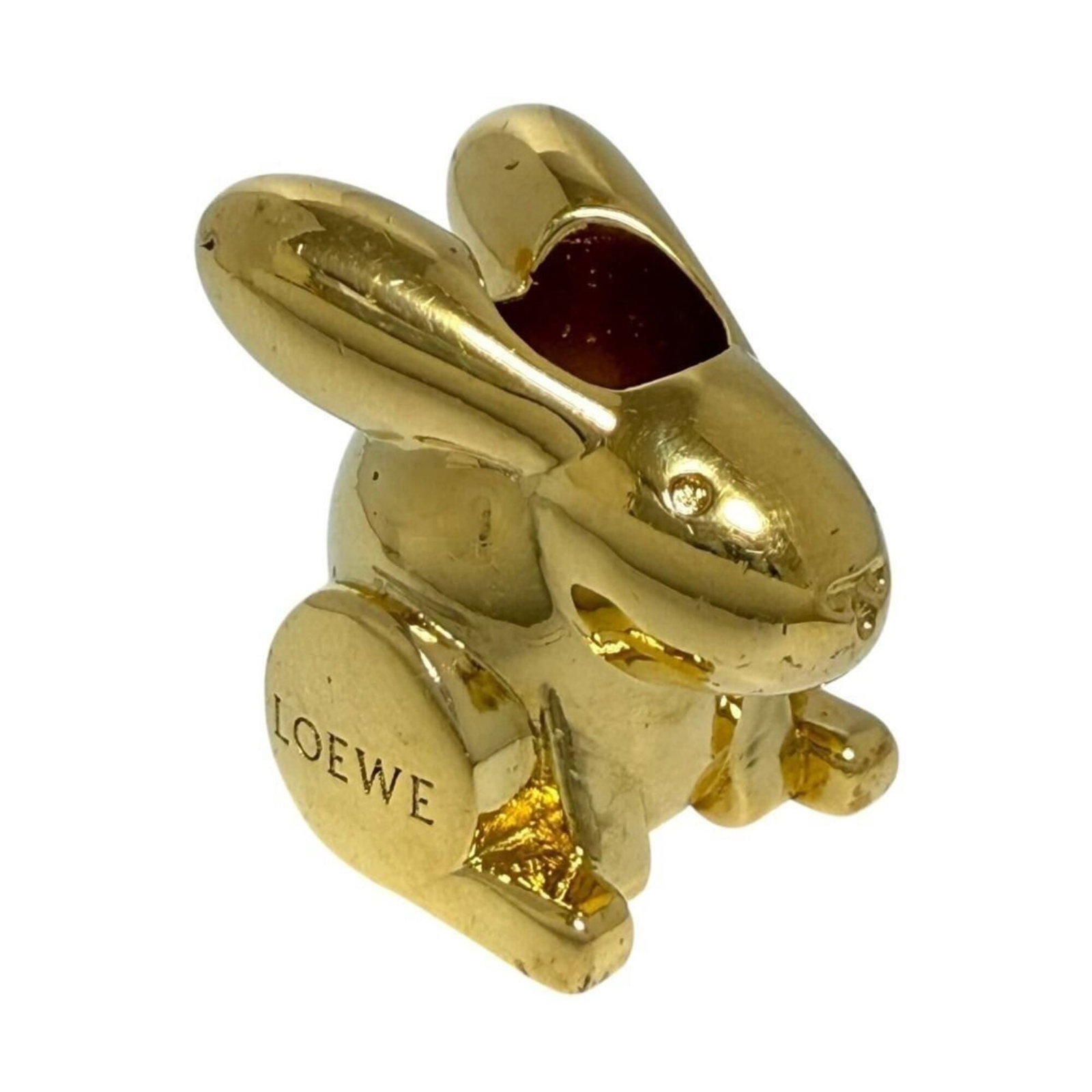 Metal charm handbag Loewe: Metal charm handbag Loewe Metal charm handbag from Loewe, crafted in Spain with a gold finish. This unique piece features metal material and a distinctive charm design. A notable aspect of this item i