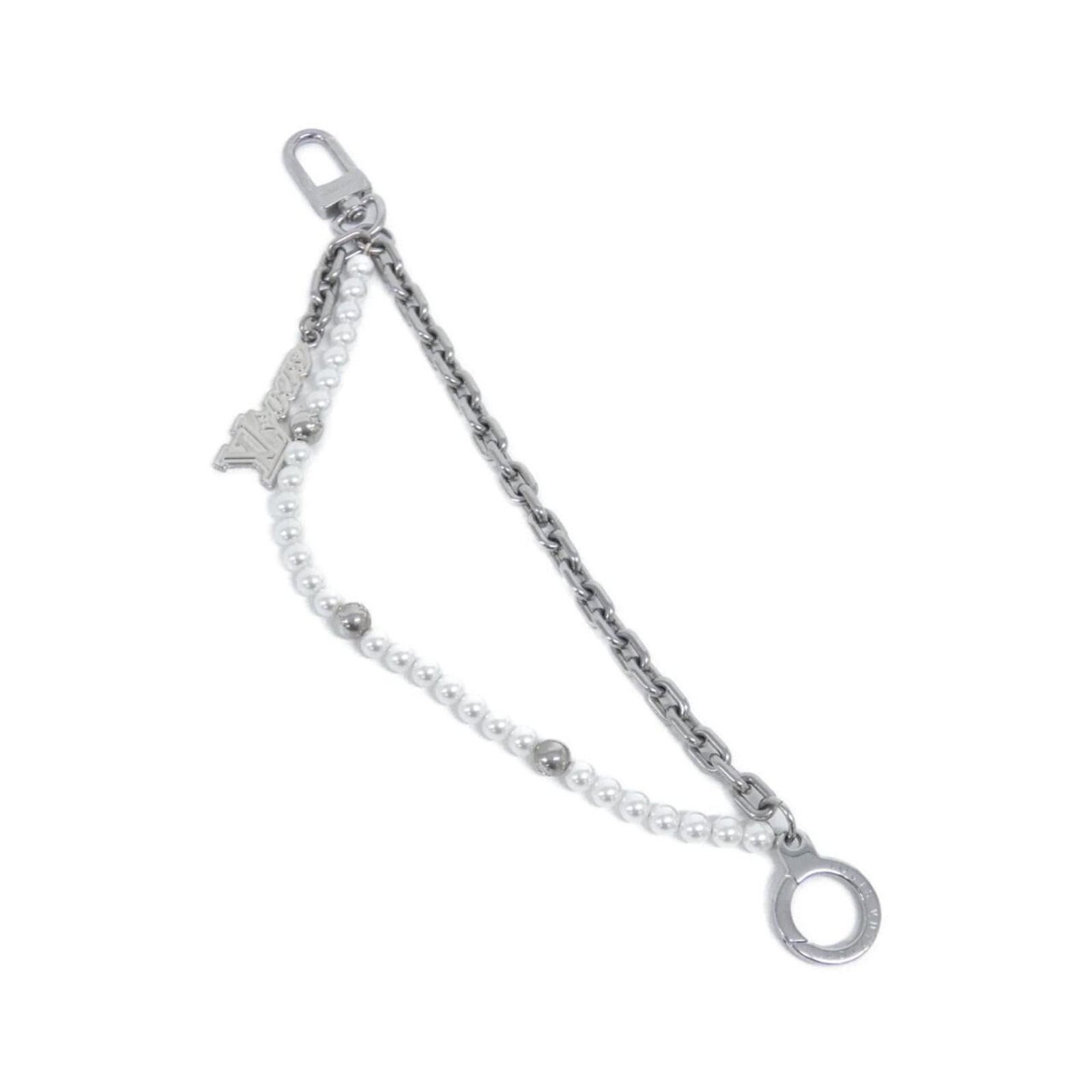 Louis Vuitton Handbag Charm: Louis Vuitton Handbag Charm Silver Louis Vuitton handbag charm, presented in its original box and dust bag, bears the MPN M03024. This accessory showcases the iconic Louis Vuitton brand. The charm com