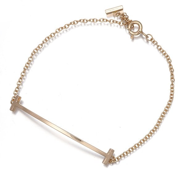 Tiffany&Co. Bracelet Tiffany T Smile Small 18K 750 Rose Gold: Tiffany&Co. Bracelet Tiffany T Smile Small 18K 750 Rose Gold Tiffany & Co.'s iconic Tiffany T Smile Small bracelet shines in 18k rose gold, its delicate design featuring an inner circumference of 15cm