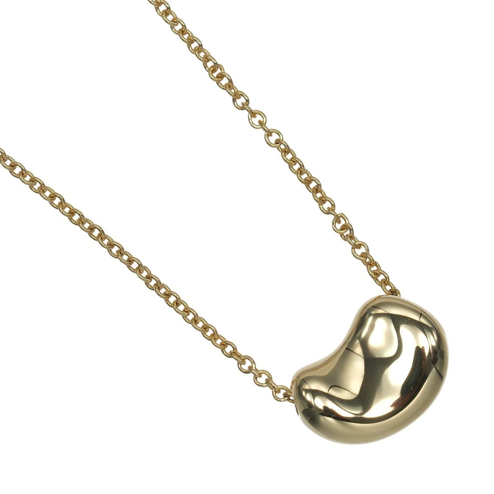 Tiffany & Co. Bean Necklace 18K Yellow Gold Approx. 3.0G: Tiffany & Co. Bean Necklace 18K Yellow Gold Approx. 3.0G 18K Yellow Gold Bean Necklace from Tiffany & Co. features a 7.5mm x 10mm pendant suspended from a 40 cm chain, showcasing the elegant simplicit
