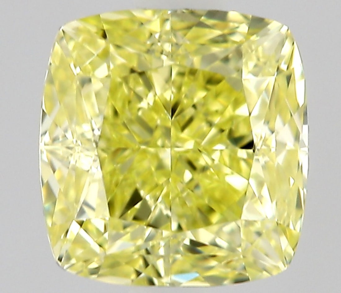 GIA Cushion Modified 0.7ct Fancy Intense Yellow VVS1 - Loose Natural Diamond: GIA Cushion Modified 0.7ct Fancy Intense Yellow VVS1 - Loose Natural Diamond GIA-certified, this 0.7ct Fancy Intense Yellow VVS1 diamond boasts exceptional clarity and color, with its EX polish and VG