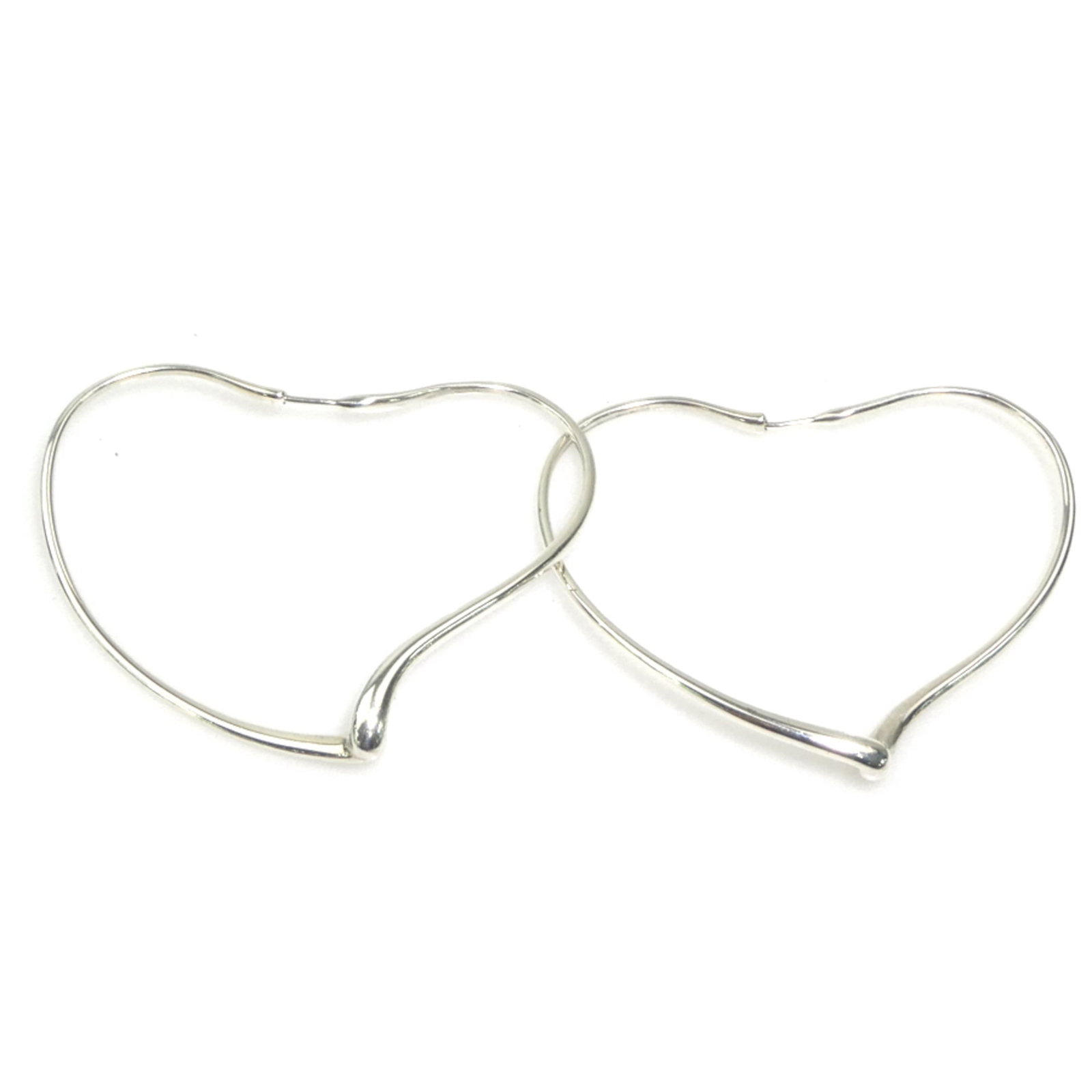 Hoop earrings silver 925 by Tiffany: Hoop earrings silver 925 by Tiffany Silver 925 hoop earrings from Tiffany, featuring a sleek and modern design with a silver finish. Made from high-quality sterling silver, these earrings are durable 