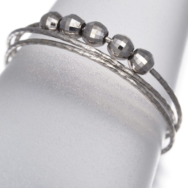 Cut Ball Bead One Size Fits All Ring 18K 750 White Gold: Cut Ball Bead One Size Fits All Ring 18K 750 White Gold 18k White Gold Ring with Cut Ball Bead Design, Available in One Size Fits All. This elegant ring features a unique cut ball bead design set in 1