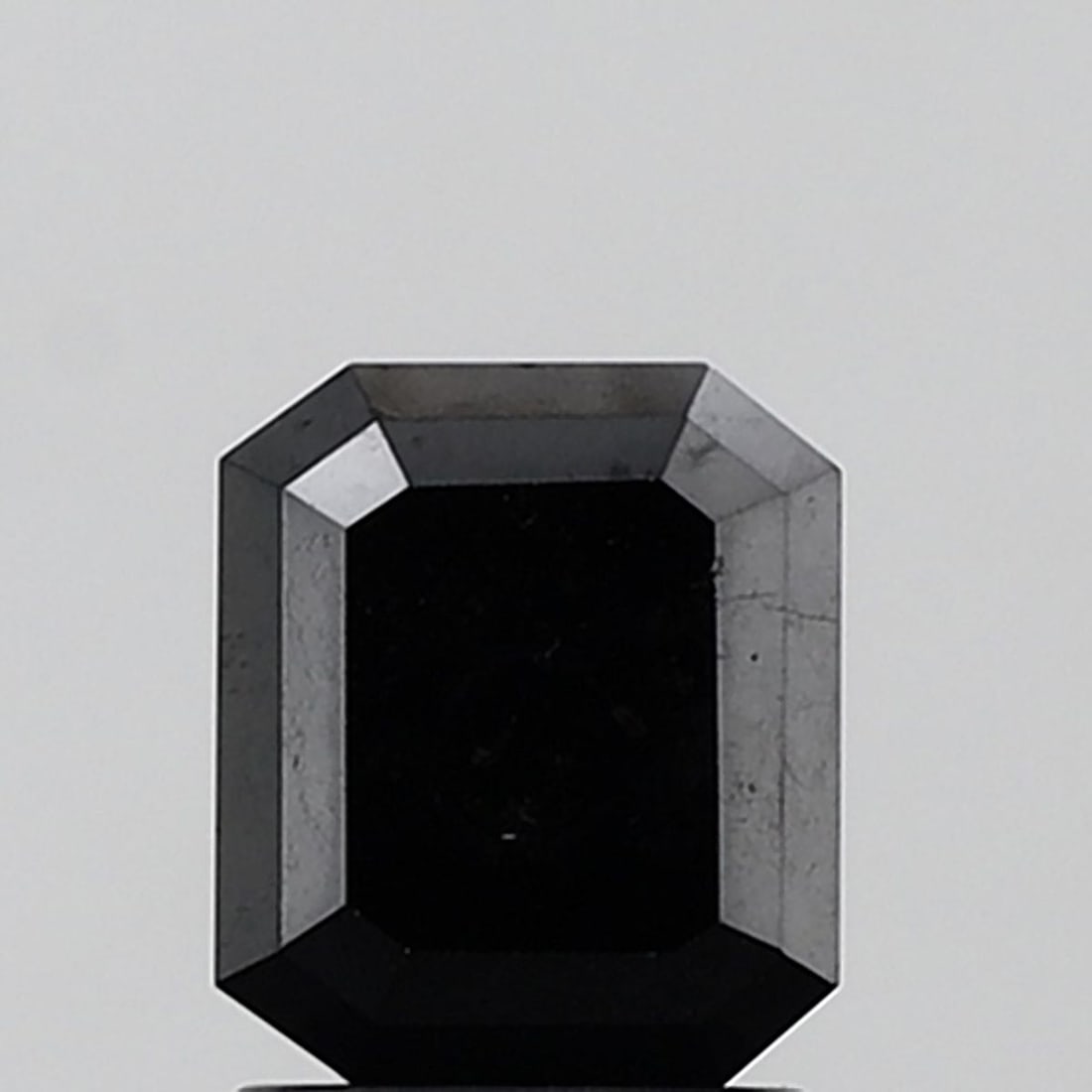 Emerald 2.05ct Black VVS2 - Loose Natural Diamond: Emerald 2.05ct Black VVS2 - Loose Natural Diamond 2.05ct Black VVS2 Emerald Cut Diamond - Natural Loose GemstoneThe 2.05ct black diamond boasts an EX polish and symmetry, giving it a high level of bri