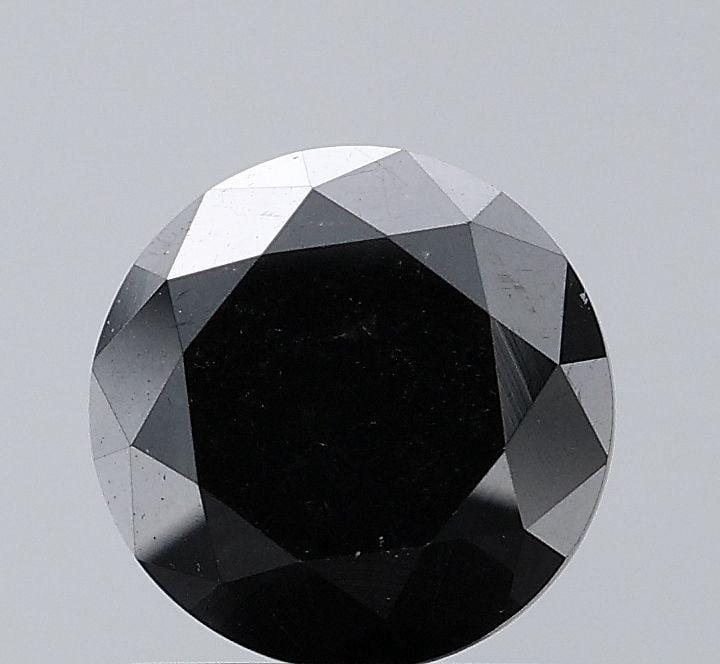 Round 1.71ct Black VVS2 - Loose Natural Diamond: Round 1.71ct Black VVS2 - Loose Natural Diamond The 1.71ct black diamond boasts exceptional clarity and polish, with a VVS2 grade indicating minimal inclusions and a high level of brilliance. Its EX c