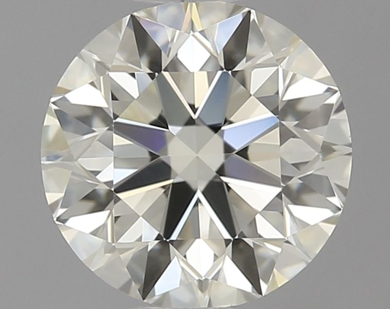 IGI Round 0.9ct L VVS2 - Loose Natural Diamond: IGI Round 0.9ct L VVS2 - Loose Natural Diamond 0.9ct IGI Round L VVS2 Diamond - Natural BeautyThis exquisite loose natural diamond boasts an impressive 0.9 carats, cut to perfection with an EX polish