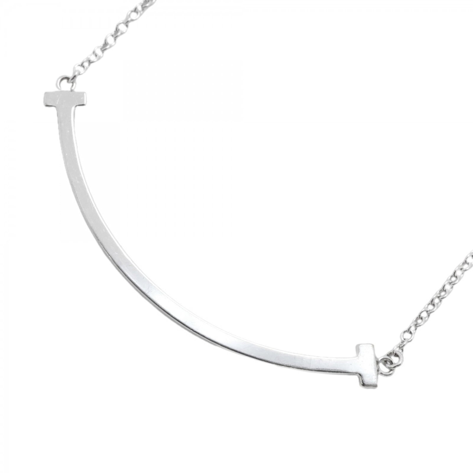 Small White Gold Necklace for Women's T Smile Tiffany: Small White Gold Necklace for Women's T Smile Tiffany Small White Gold Necklace for Women's T Smile Tiffany features an elegant 10.3mm x 37.8mm pendant made from high-quality white gold (18K). This be