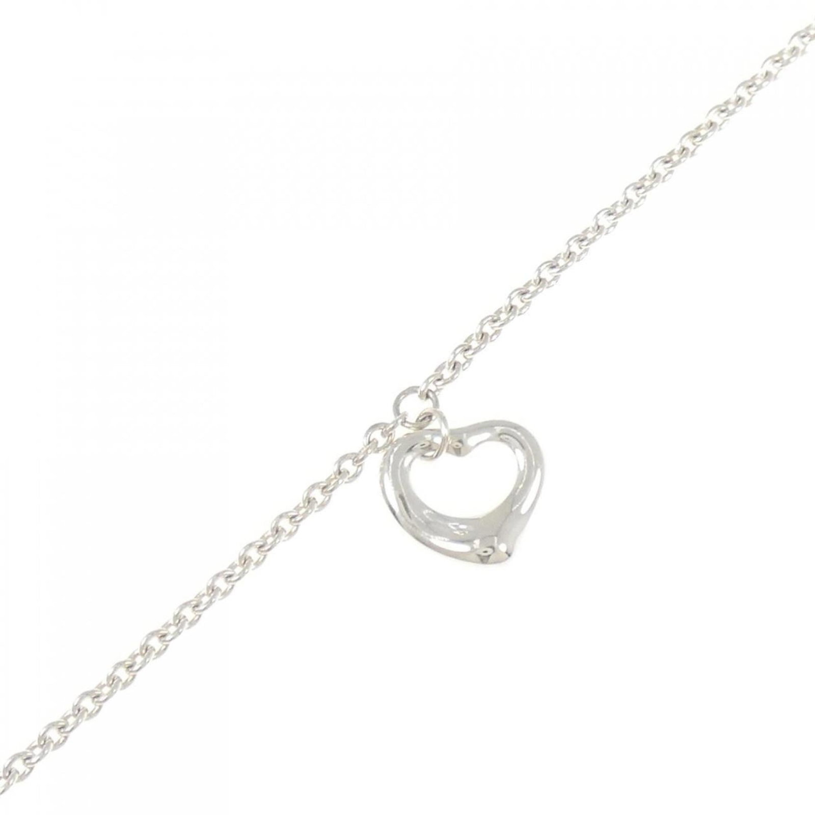 Tiffany Charm Bracelet Silver 925: Tiffany Charm Bracelet Silver 925 Silver 925 Tiffany Charm Bracelet with a sleek and modern design, featuring an open heart charm. This stylish bracelet measures 18cm in length and weighs just 2.5g, m