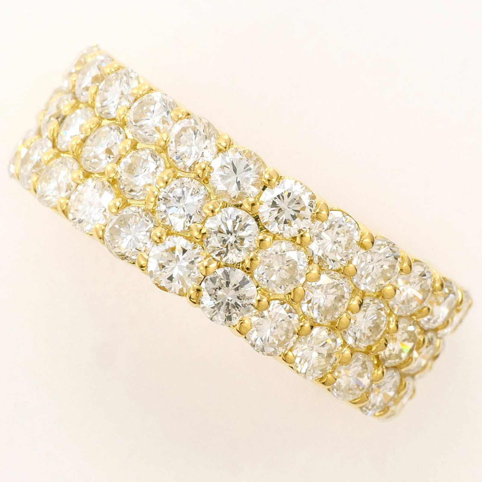 Unbranded Band Ring Yellow Gold (18K): Unbranded Band Ring Yellow Gold (18K) Yellow gold band ring with a diamond weighing 3.23 carats, set in an 18K metal construction, measuring 7mm wide and available in US size 7.5. This unbranded piece