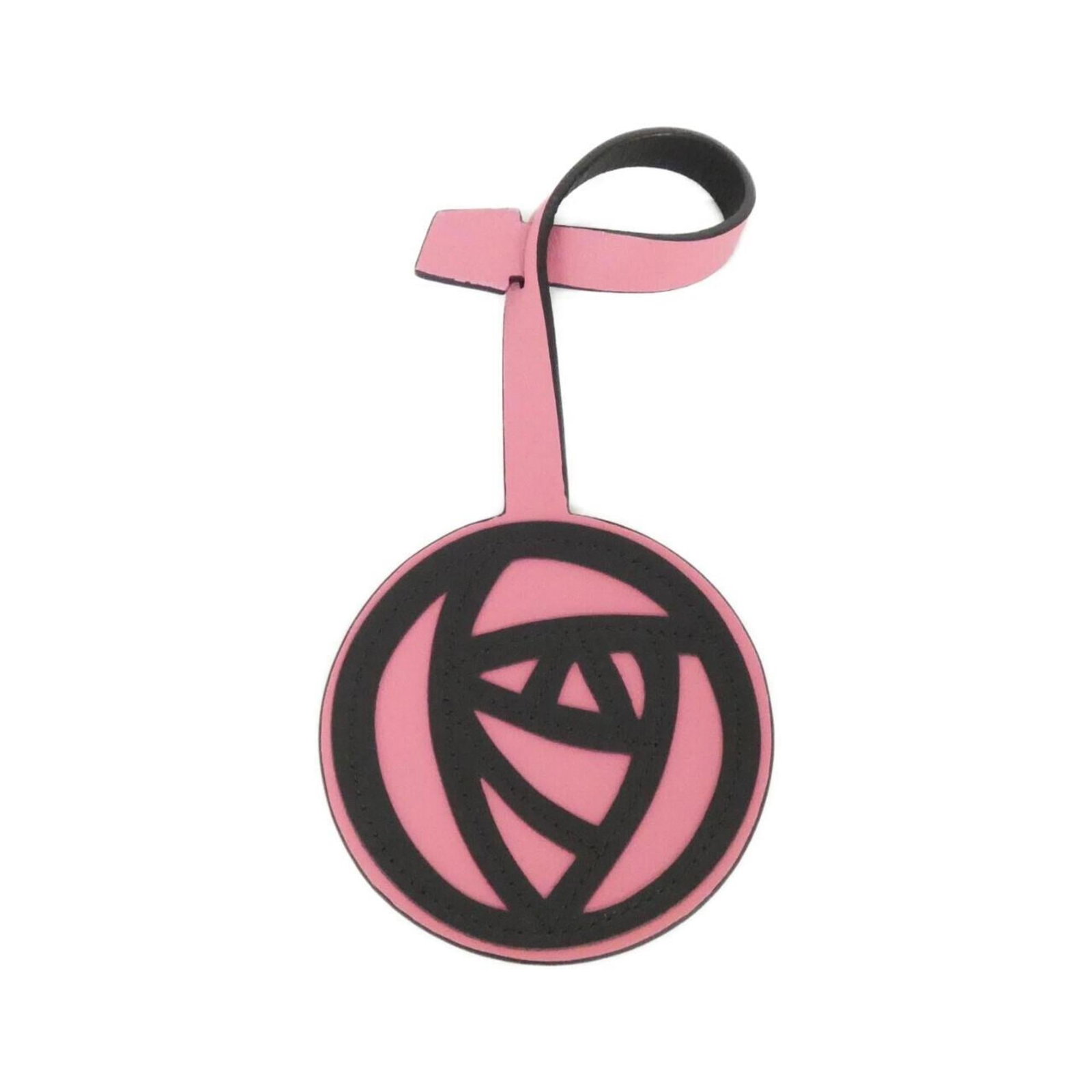 Handbag Charm of Leather by Loewe: Handbag Charm of Leather by Loewe The Loewe Handbag Charm is a sleek and sophisticated accessory, crafted from high-quality leather in two stylish colors. Measuring 110mm x 110mm with a chain length