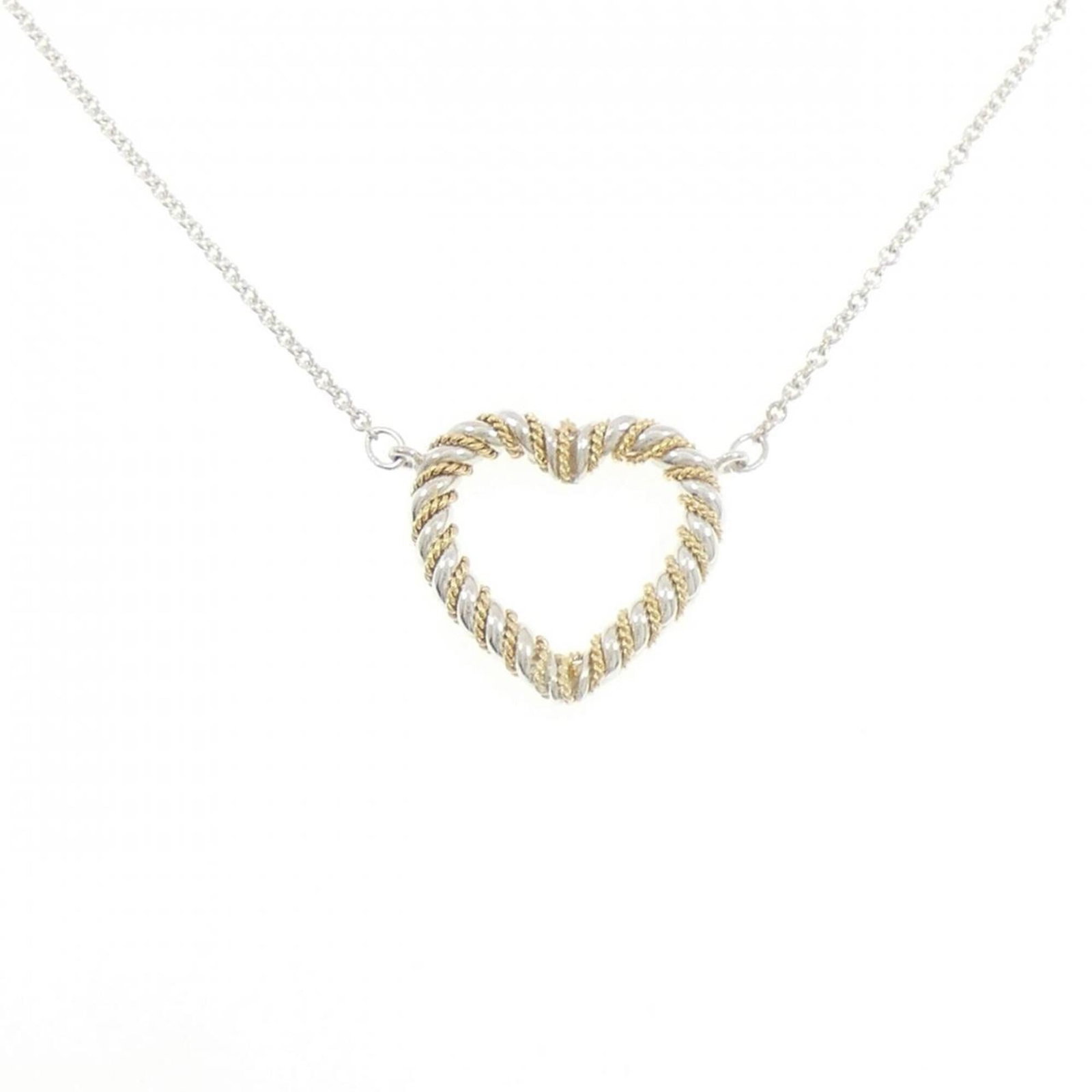 Tiffany & Co. 925 750Yg Necklace: Tiffany & Co. 925 750Yg Necklace Tiffany & Co. 925 750Yg Necklace features a stunning pendant made from silver 925 and yellow gold (18K), showcasing exceptional craftsmanship in its intricate design.