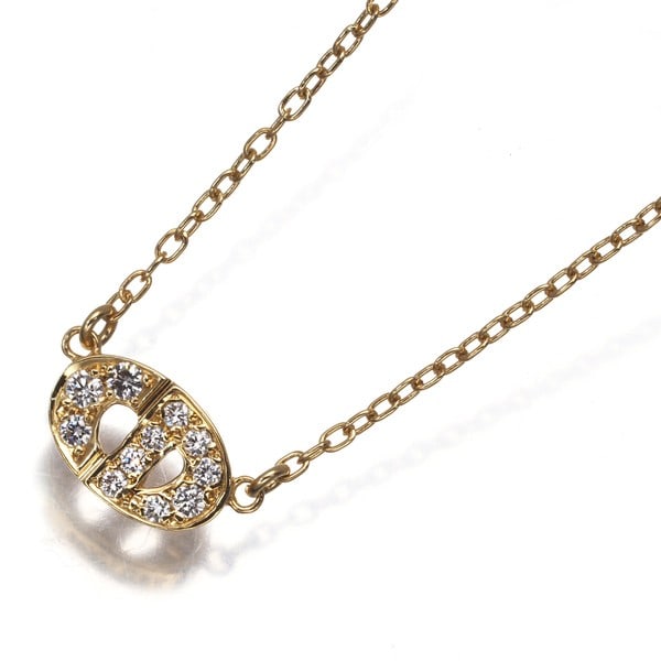 Diamond necklace logo in yellow gold 18k Christian Dior: Diamond necklace logo in yellow gold 18k Christian Dior Yellow gold 18k Christian Dior diamond necklace logo pendant, featuring a natural diamond set in a 6.0 x 9.5mm pendant surrounded by the iconic 