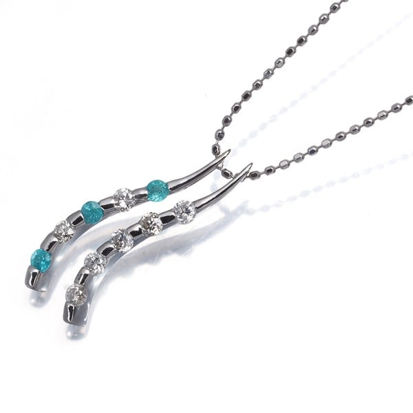 Paraiba Tourmaline 0.09Ct Diamond 0.25Ct Necklace 18K 750 White Gold: Paraiba Tourmaline 0.09Ct Diamond 0.25Ct Necklace 18K 750 White Gold 18k white gold necklace featuring a stunning Paraiba Tourmaline pendant, paired with a total of 0.09ct and 0.25ct diamonds. The nat