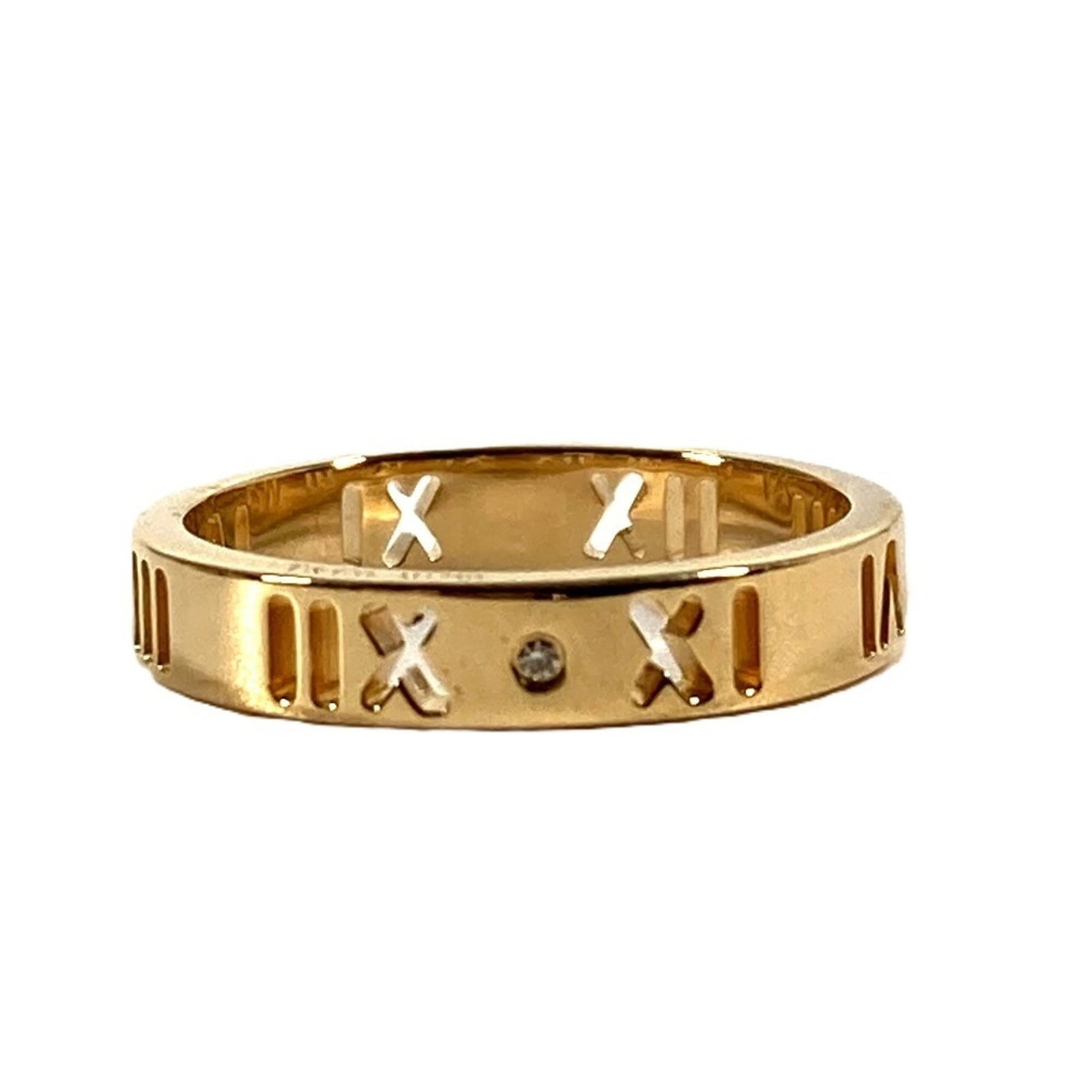 Tiffany band ring gold 18k: Tiffany band ring gold 18k 18k gold band ring from Tiffany, featuring a diamond stone and available in US size 5. This elegant piece showcases the brand's signature style with its classic design and h