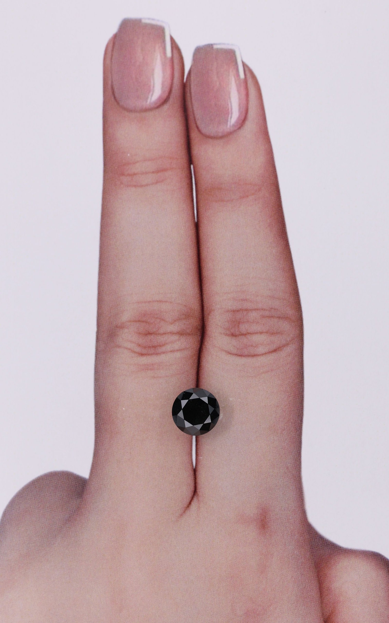 Round 1.67ct Fancy Black VVS2 - Loose Natural Diamond: Round 1.67ct Fancy Black VVS2 - Loose Natural Diamond Round 1.67ct Fancy Black VVS2 - Loose Natural Diamond. This exquisite diamond boasts an EX cut, showcasing its exceptional brilliance and fire, wi
