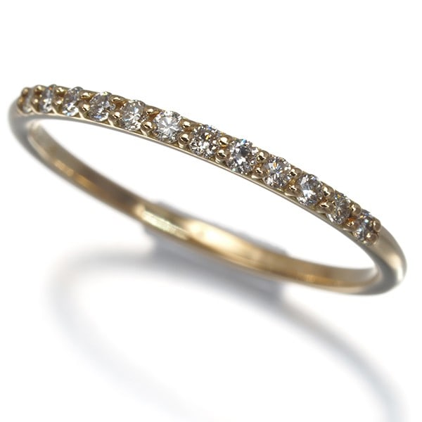 Ahkah Ring Diamond 0.12Ct Dousebrier Us5 18K 750 Yellow Gold: Ahkah Ring Diamond 0.12Ct Dousebrier Us5 18K 750 Yellow Gold The Ahkah Ring features a natural diamond, weighing 0.12 carats, set in 18k yellow gold with a ring size of US5 and a width of 1.3mm. This 