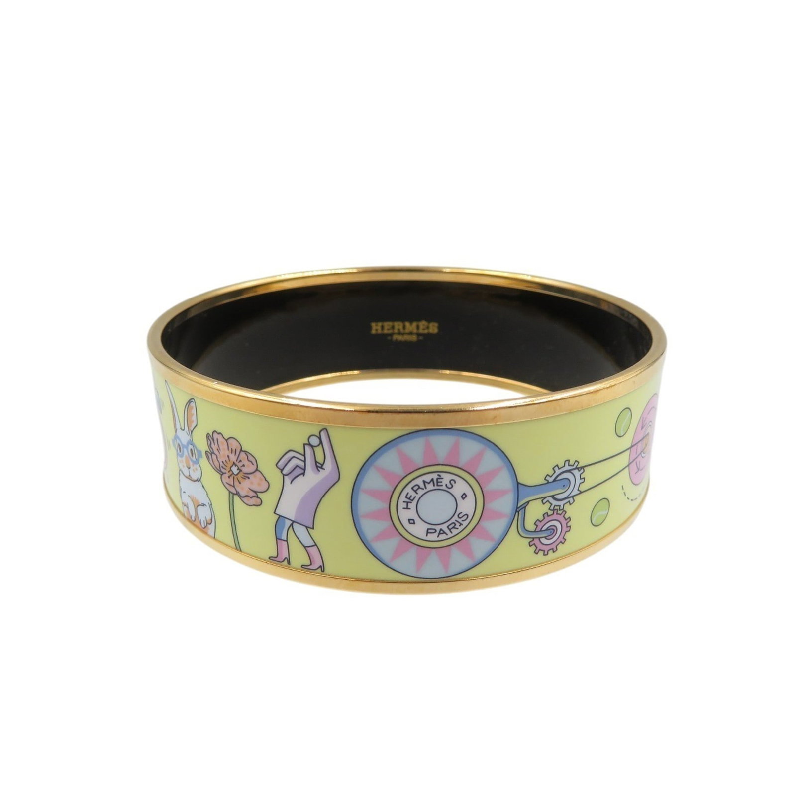 Hermes Bangle Metal: Hermes Bangle Metal Yellow Metal Bangle from Hermes, presented in a luxurious box and dust bag for protection. This metal bangle boasts a striking yellow color, adding a pop of brightness to any outfi