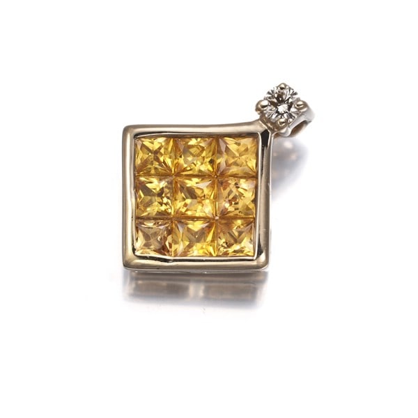 Yellow Sapphire 0.64Ct Diamond 0.02Ct Pendant 18K 750 Yellow Gold: Yellow Sapphire 0.64Ct Diamond 0.02Ct Pendant 18K 750 Yellow Gold Yellow Sapphire and Diamond Pendant in 18K Yellow Gold. This elegant pendant showcases a vibrant 0.64ct yellow sapphire surrounded by 