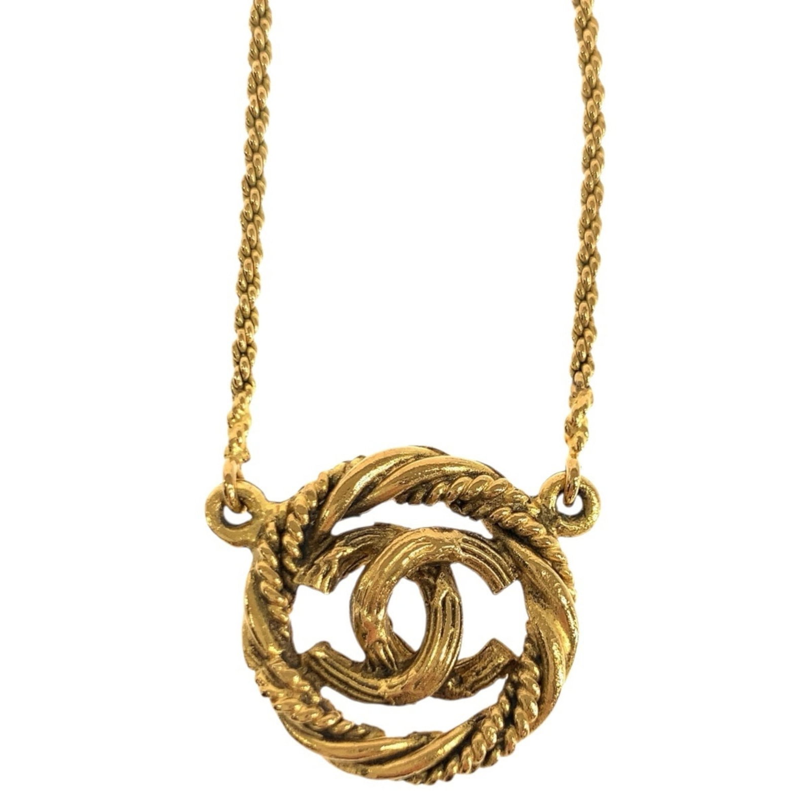 Chanel Vintage Coco Mark Gold Metal Necklace Pendant: Chanel Vintage Coco Mark Gold Metal Necklace Pendant Gold Metal Necklace Pendant from Chanel's Vintage Coco Collection. This elegant necklace features a gold metal pendant with a diameter of 20mm x 20