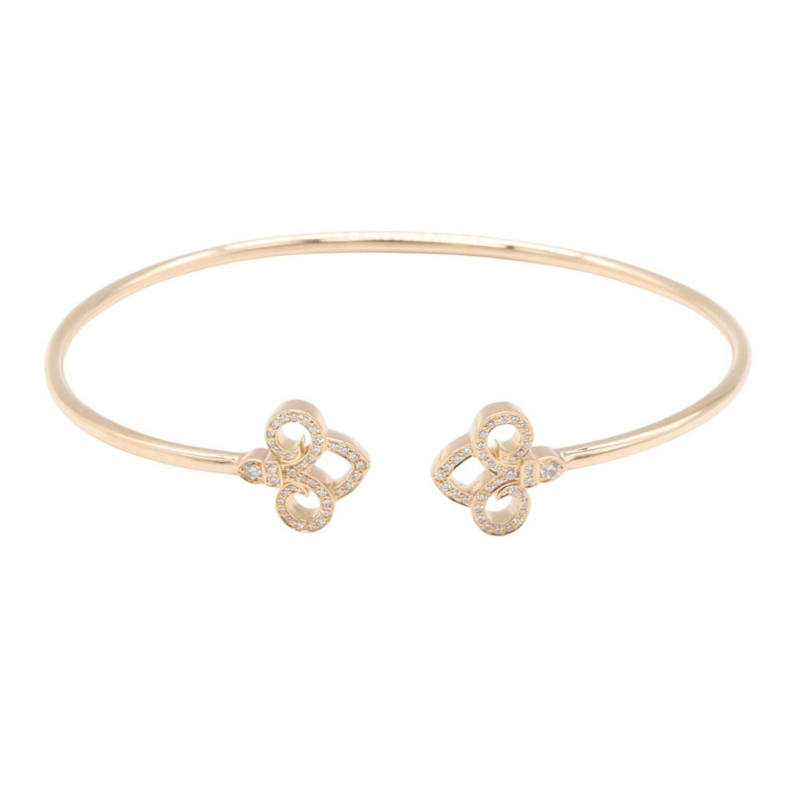 Pink Gold 18K Tiffany Charm Bracelet: Pink Gold 18K Tiffany Charm Bracelet Pink gold (18K) charm bracelet from Tiffany, featuring clear and gold details. This 16cm long bracelet showcases the brand's signature style with its elegant