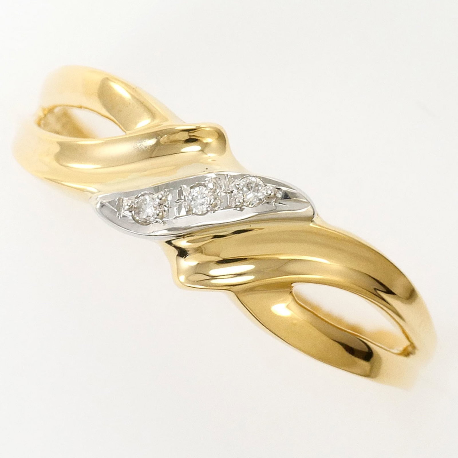 Unbranded Platinum Gold 18K Yellow Ring Band: Unbranded Platinum Gold 18K Yellow Ring Band Platinum and yellow gold come together in this elegant 18K band ring, featuring a subtle 0.02 carat diamond set into its center. The platinum 900 alloy pro