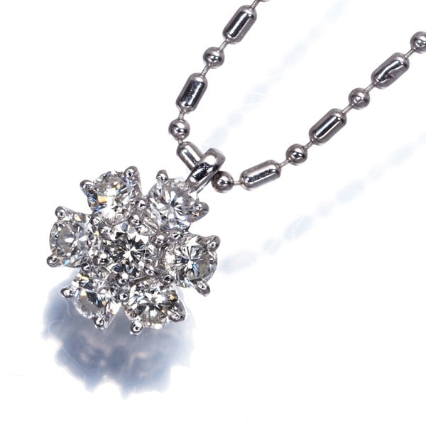 Diamond 0.71Ct Flower Necklace 900 850 Platinum: Diamond 0.71Ct Flower Necklace 900 850 Platinum 900 / 850 Platinum Diamond Flower Pendant Necklace features a beautiful 0.71ct natural diamond at its center, set within an intricate flower-shaped plat