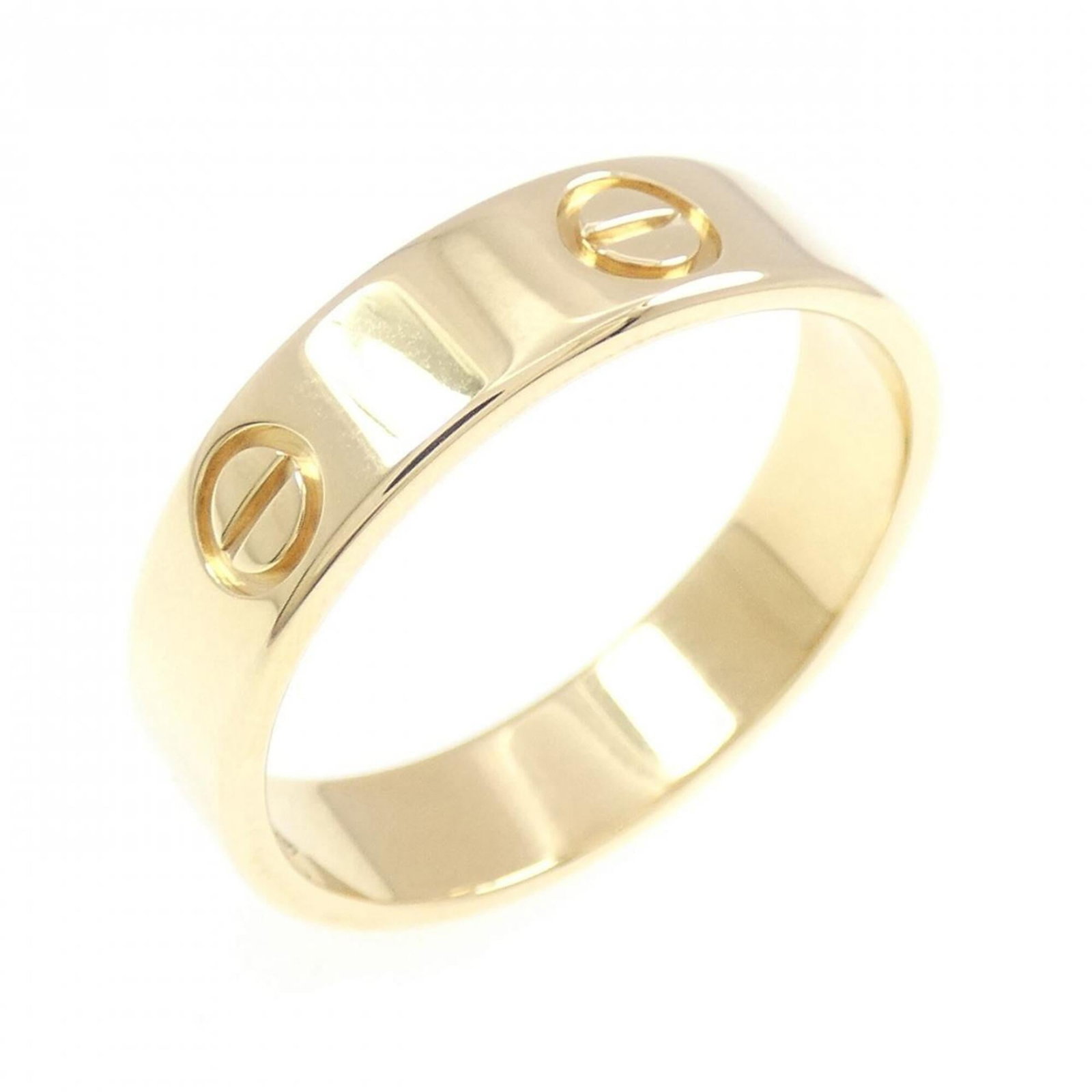 Yellow Gold Cartier 18K Ring: Yellow Gold Cartier 18K Ring Yellow Gold Cartier 18K Ring - A stunning piece from renowned luxury brand Cartier, crafted in 18K yellow gold. This beautiful band ring features a classic design that exu
