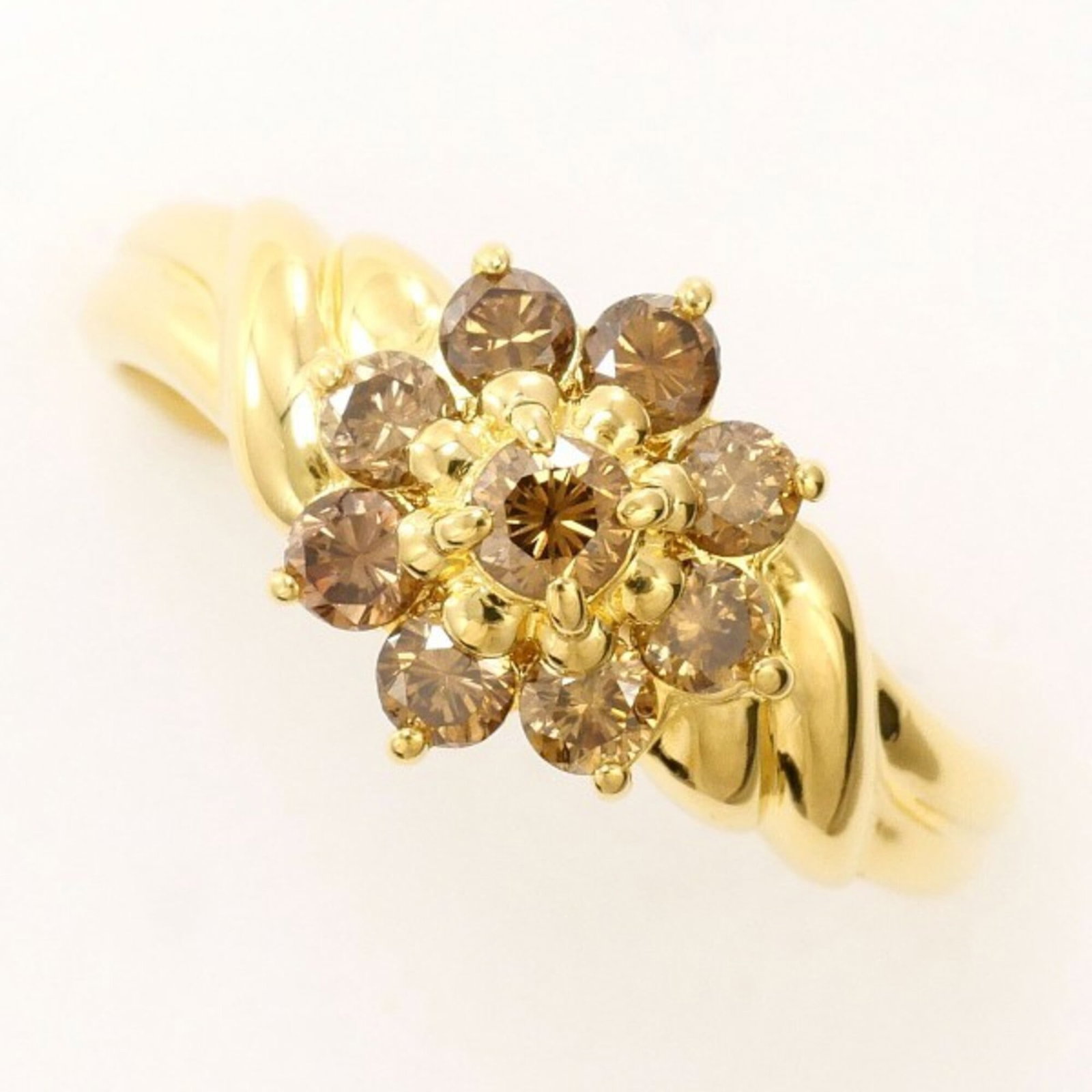 Unbranded Band Ring Yellow Gold (18K): Unbranded Band Ring Yellow Gold (18K) Yellow gold band ring with a 0.58ct diamond, crafted from 18K metal for a touch of elegance and sophistication. This unbranded piece boasts a classic design and p