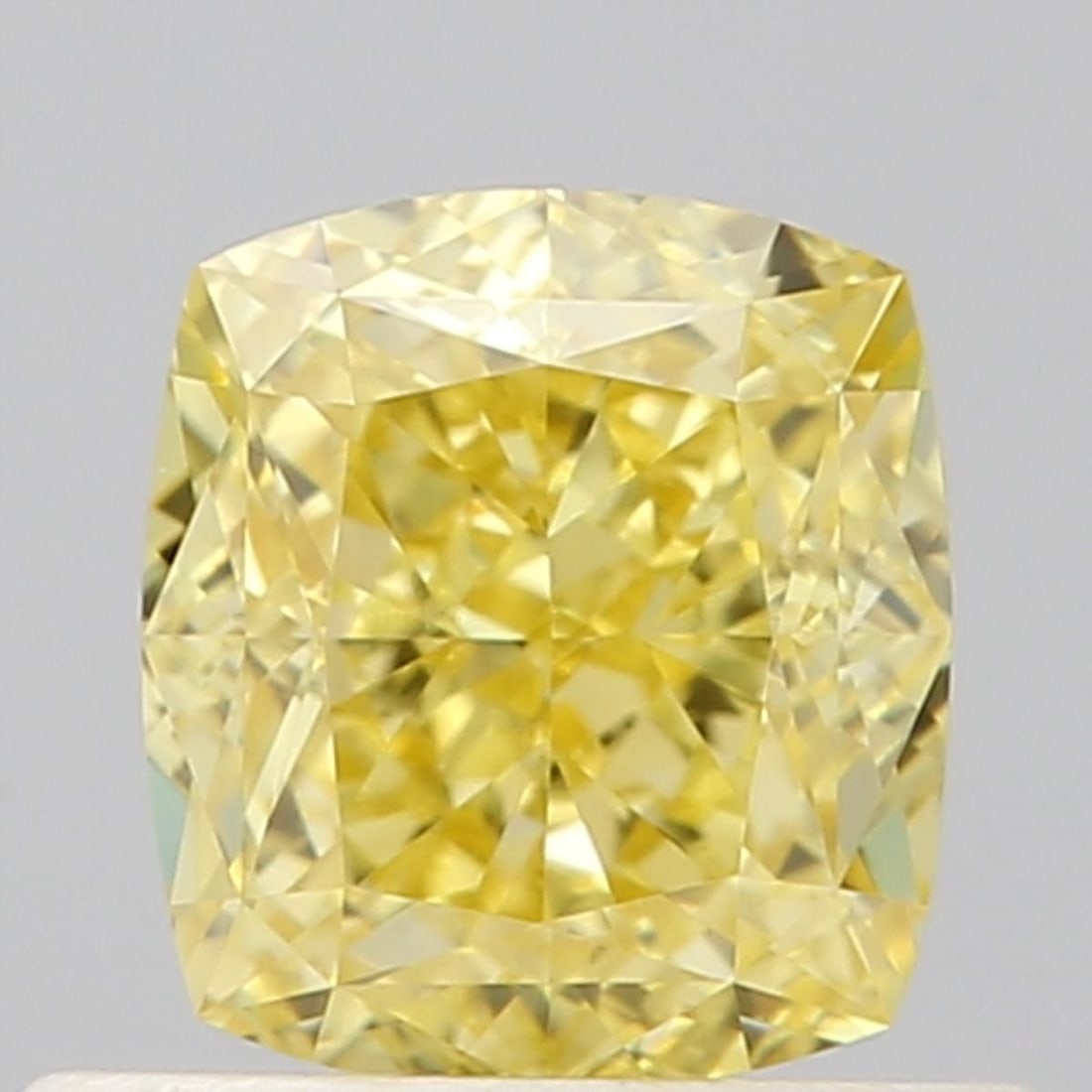 GIA Cushion Brilliant 0.63ct Fancy Intense Yellow VVS1 - Loose Natural Diamond: GIA Cushion Brilliant 0.63ct Fancy Intense Yellow VVS1 - Loose Natural Diamond GIA-certified, the 0.63ct Fancy Intense Yellow VVS1 diamond boasts exceptional clarity and vibrant color, making it a sta