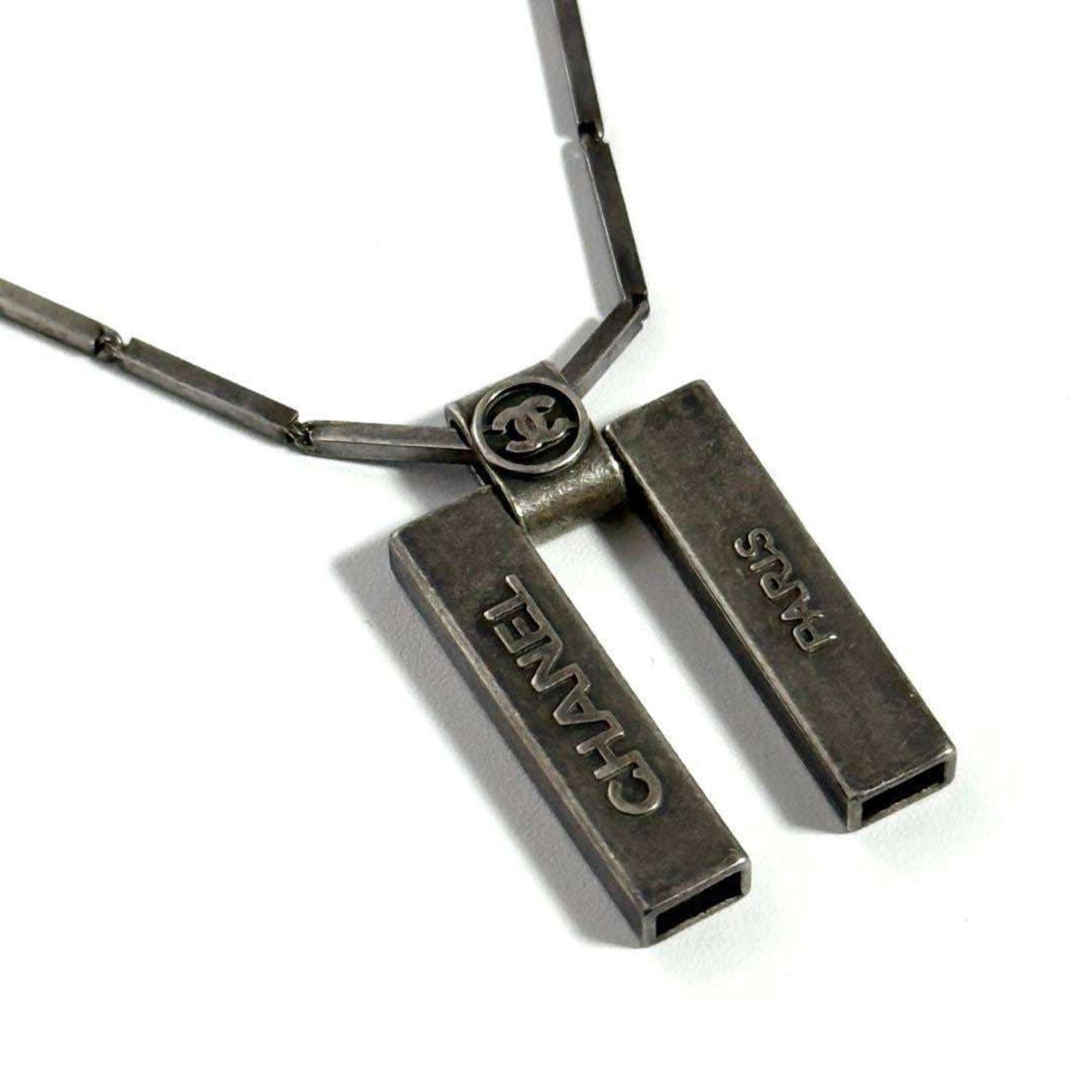 Women's Necklace Pendant by Chanel: Women's Necklace Pendant by Chanel The Chanel Women's Necklace Pendant boasts elegant metal craftsmanship, designed to complement a wide range of neck circumferences. Available in two sizes, this neck