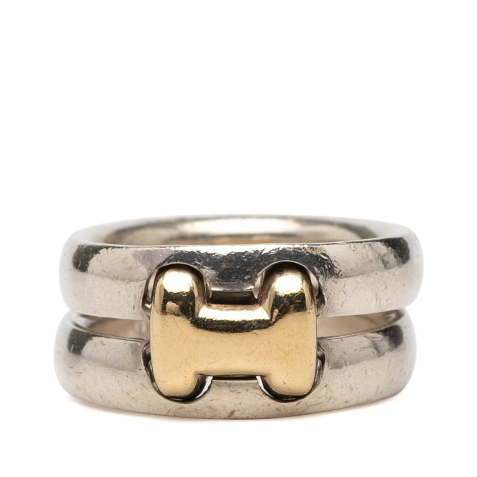 Hermes Band Ring Silver 925 Yellow Gold (18K): Hermes Band Ring Silver 925 Yellow Gold (18K) Silver 925 and yellow gold (18K) band ring from Hermes, available in US size 3.5. This elegant piece showcases the luxury of high-quality materials, perfe