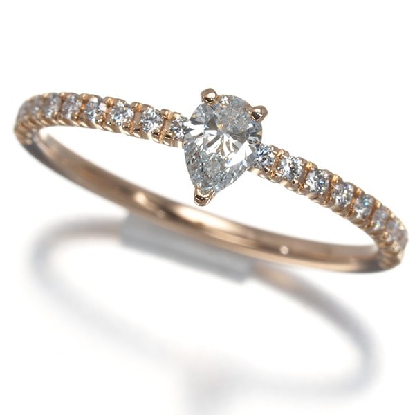 Cartier Ring Diamond Solitaire Pear-Shaped Eu49 18K Rg: Cartier Ring Diamond Solitaire Pear-Shaped Eu49 18K Rg Cartier's Etincelle de Cartier collection shines in this exquisite rose gold ring featuring a natural diamond solitaire, set in a pear-shaped des