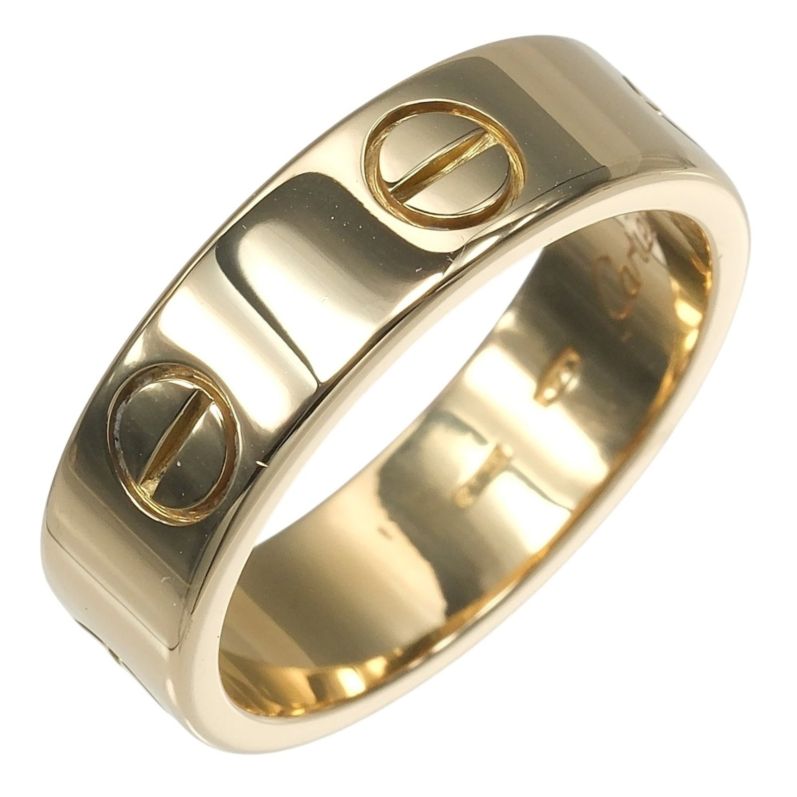Yellow Gold Cartier 18K Ring: Yellow Gold Cartier 18K Ring Yellow Gold Cartier 18K Ring - A Timeless Band. This 18k yellow gold ring features a classic band design, measuring 5.53mm in width and 16.33mm in inner diameter, making i