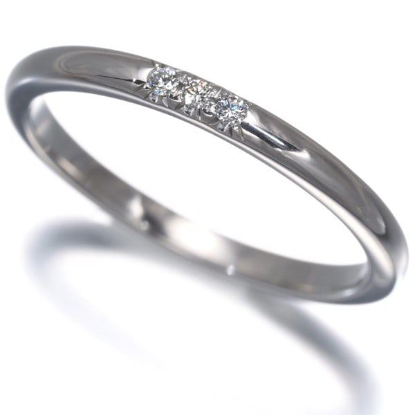 Tiffany&Co. Ring Diamond Tiffany Forever Wedding Band 3P Us6-6.25 Pt 950: Tiffany&Co. Ring Diamond Tiffany Forever Wedding Band 3P Us6-6.25 Pt 950 Tiffany & Co.'s platinum Forever Wedding Band boasts a stunning natural diamond, weighing unmarked carats. This exquisite piece