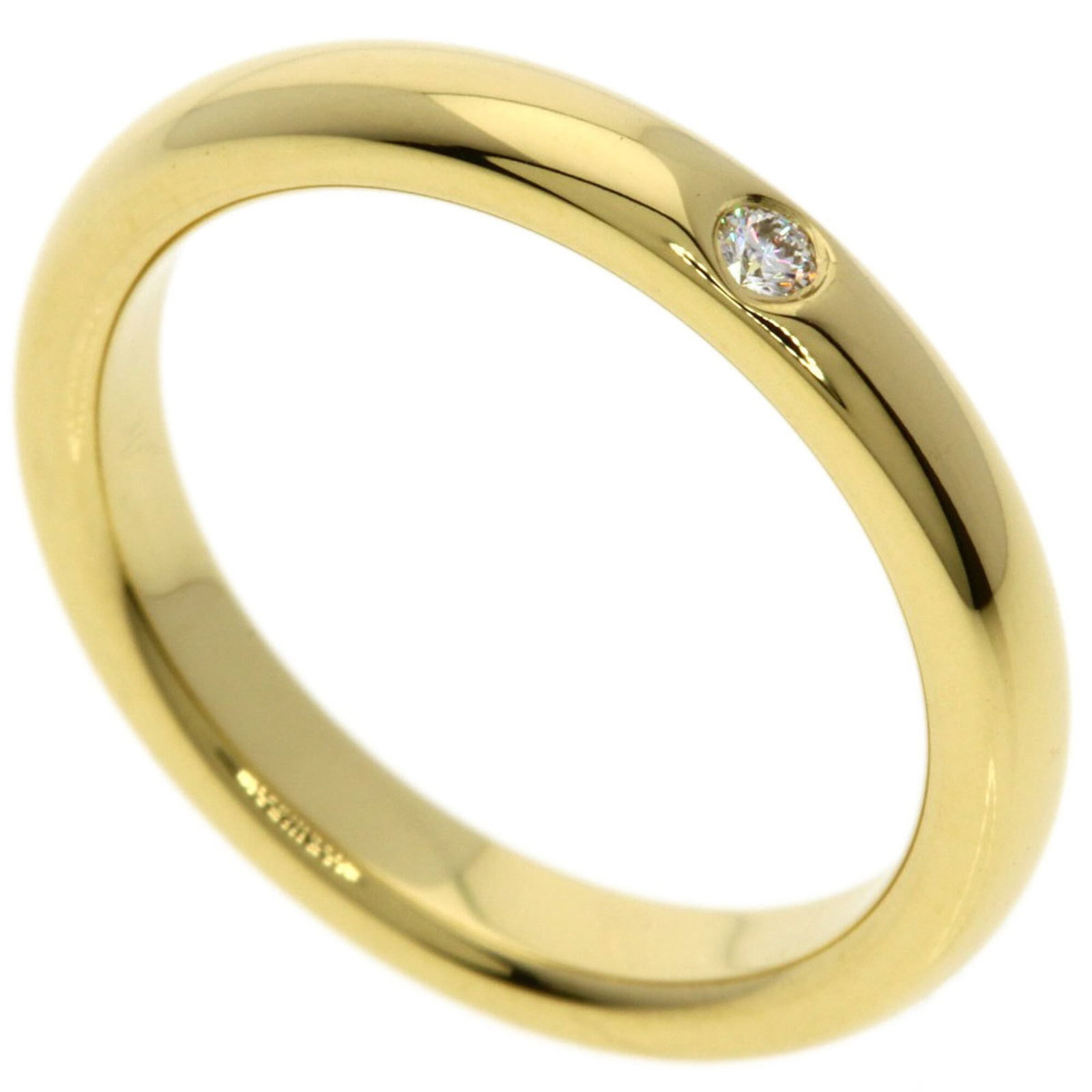 Yellow Gold 18K Tiffany Band Ring: Yellow Gold 18K Tiffany Band Ring Yellow gold (18K) band ring with a classic design, available in US size 4. This 18K yellow gold Tiffany band ring is made from high-quality materials and features a t