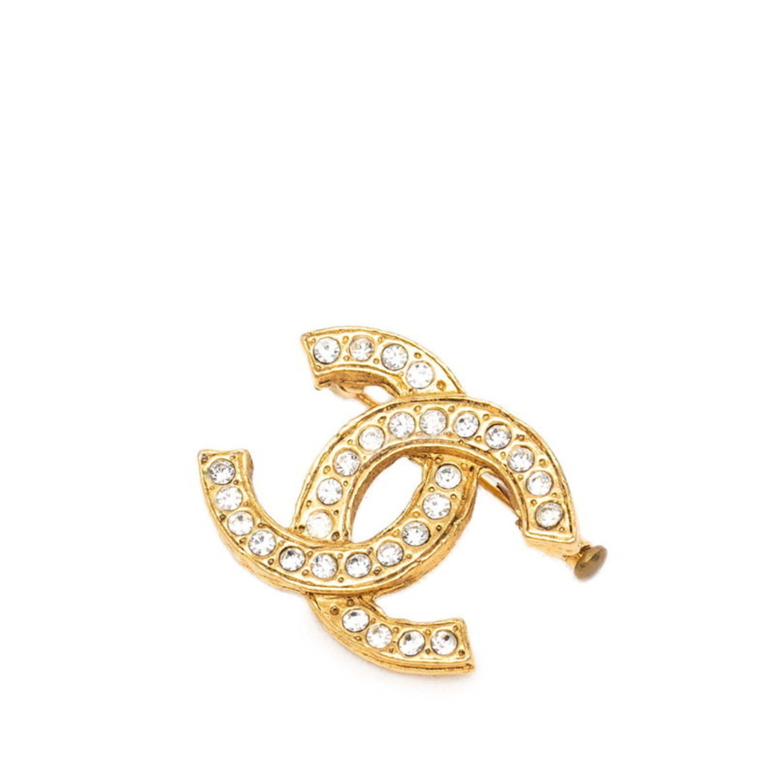 Gold plating rhinestone Chanel brooch: Gold plating rhinestone Chanel brooch Gold plating rhinestone Chanel brooch, featuring gold plating and rhinestones in a classic design. The piece measures 23.5cm x 29.5cm / 9.25'' x 11.61'', making i