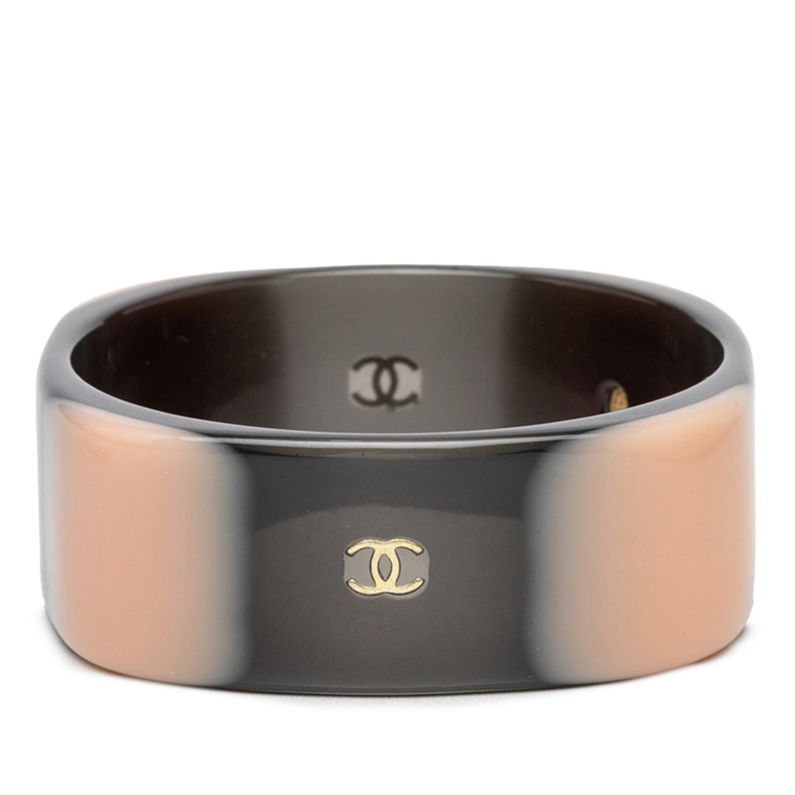 Bangle Plastic: Bangle Plastic Bangle made from plastic, available in beige and black colors. Measuring 24.5cm in length and 2.5cm in width, this bangle features a simple design. Made by the French fashion brand Chan