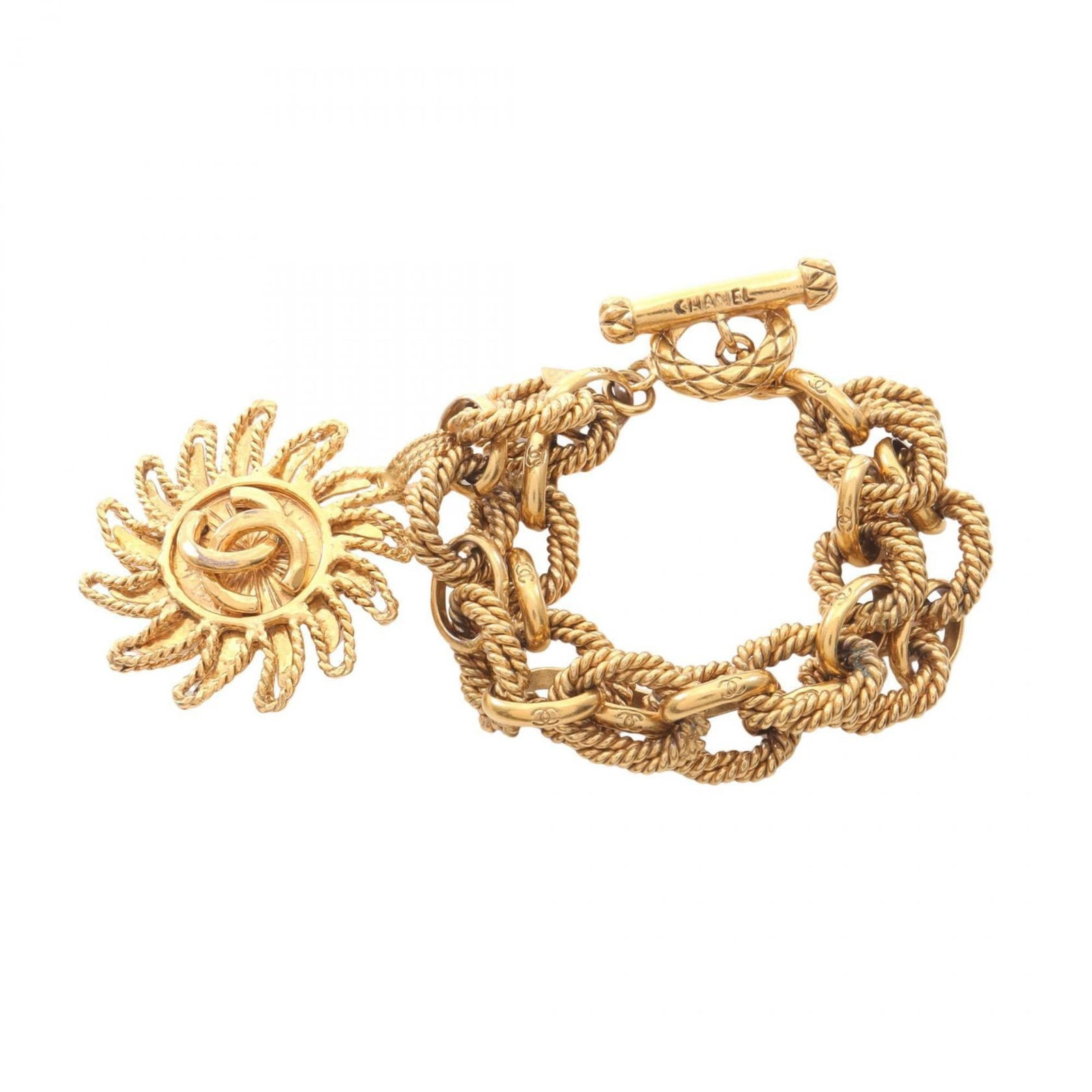 Chanel Charm Bracelet Gold Plating: Chanel Charm Bracelet Gold Plating Gold plating adds a touch of luxury to this Chanel charm bracelet, available in a sleek gold finish. The 16cm length provides a versatile fit for everyday wear. A si