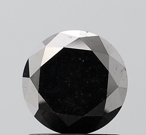 Round 1.78ct Black VVS2 - Loose Natural Diamond: Round 1.78ct Black VVS2 - Loose Natural Diamond Round 1.78ct Black VVS2 - Loose Natural Diamond, showcasing exceptional clarity and luster in its EX cut and polish. Measuring 6.87L x 6.8W x 5.34H, thi