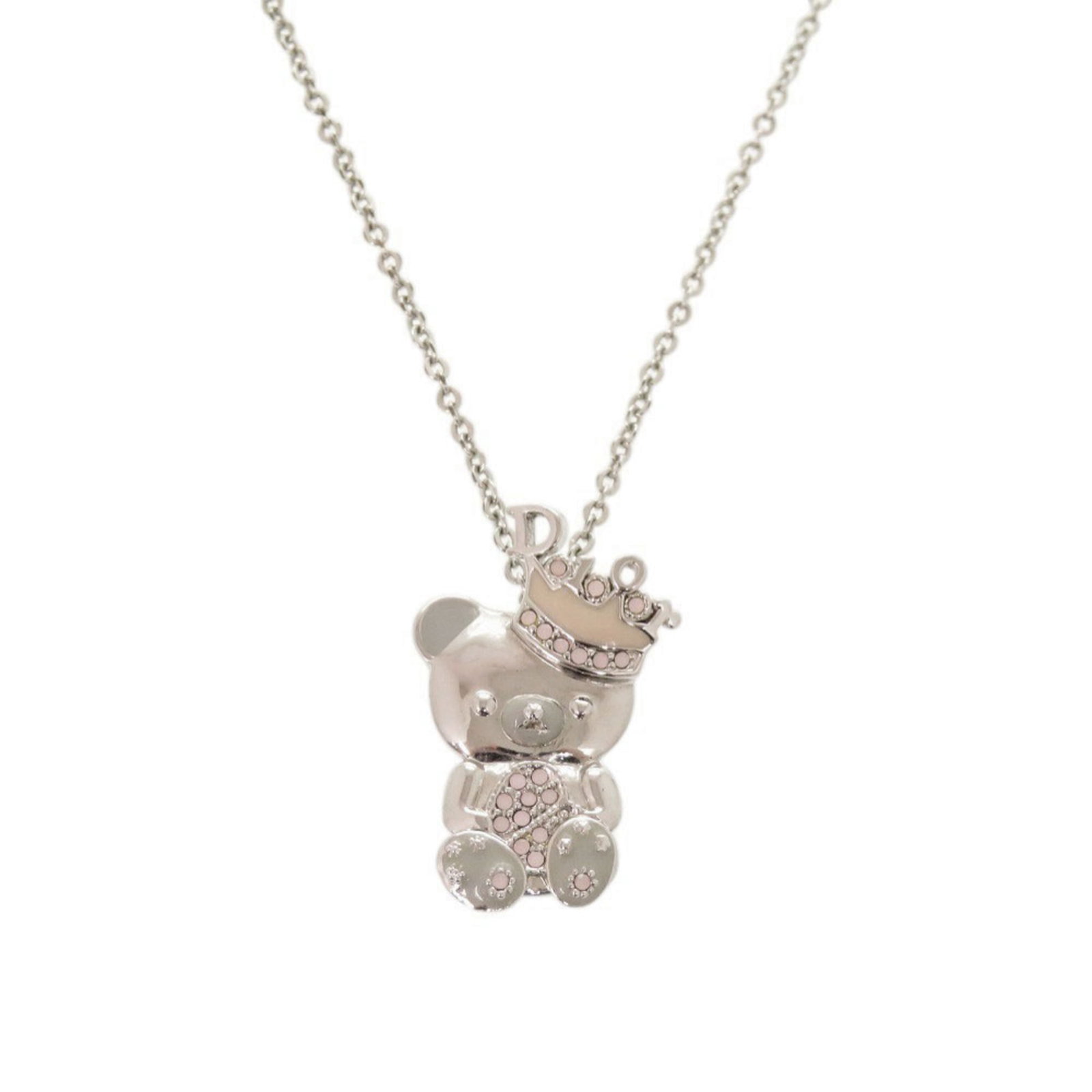Christian Dior Teddy Bear Crown Metal Silver Necklace 1642: Christian Dior Teddy Bear Crown Metal Silver Necklace 1642 Silver necklace with a metal pendant featuring the Christian Dior Teddy Bear Crown design, measuring 26mm x 16mm. The necklace has a silver c